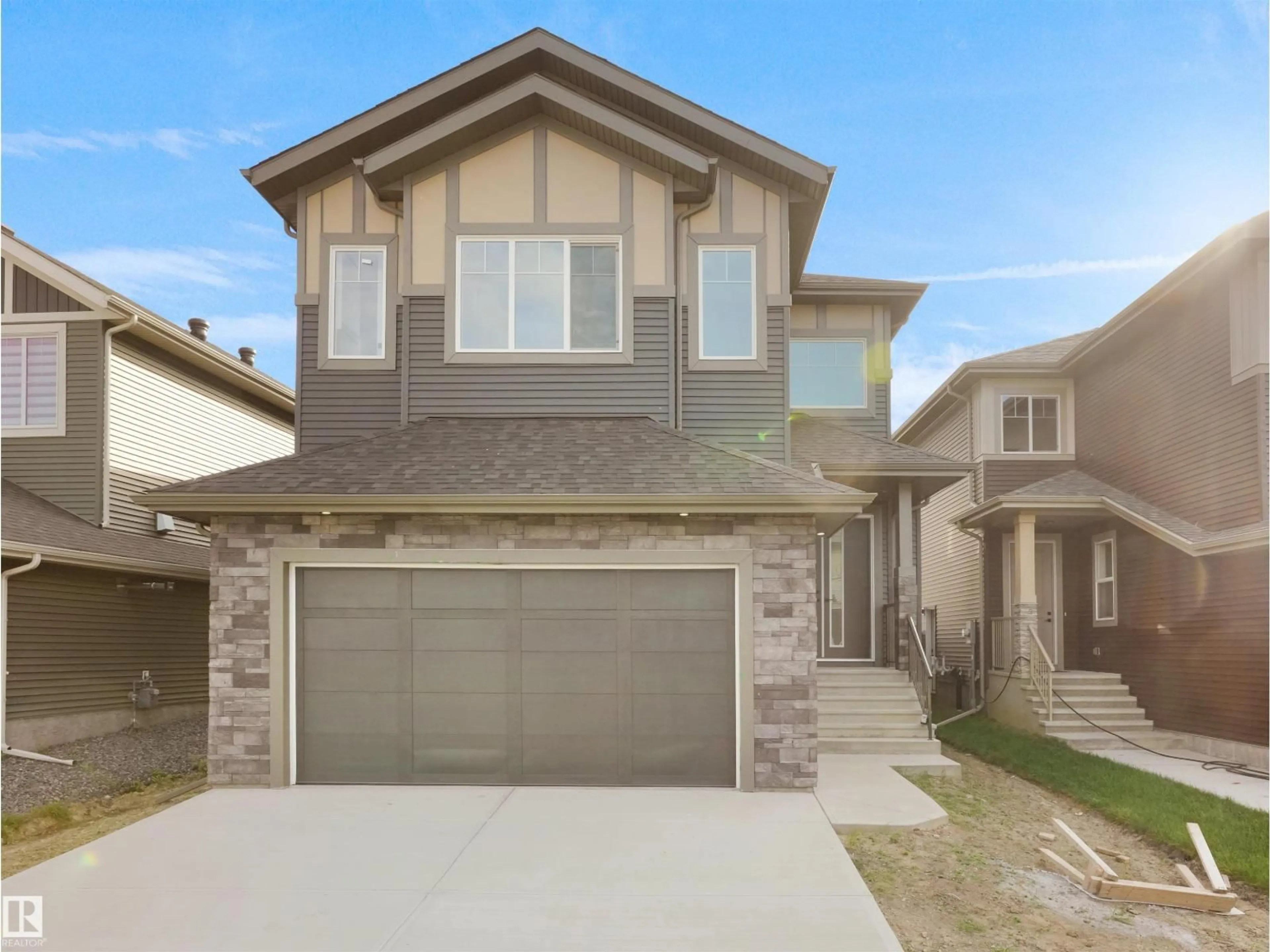 Home with brick exterior material, street for 1107 GYRFALCON CR, Edmonton Alberta T5S0S5