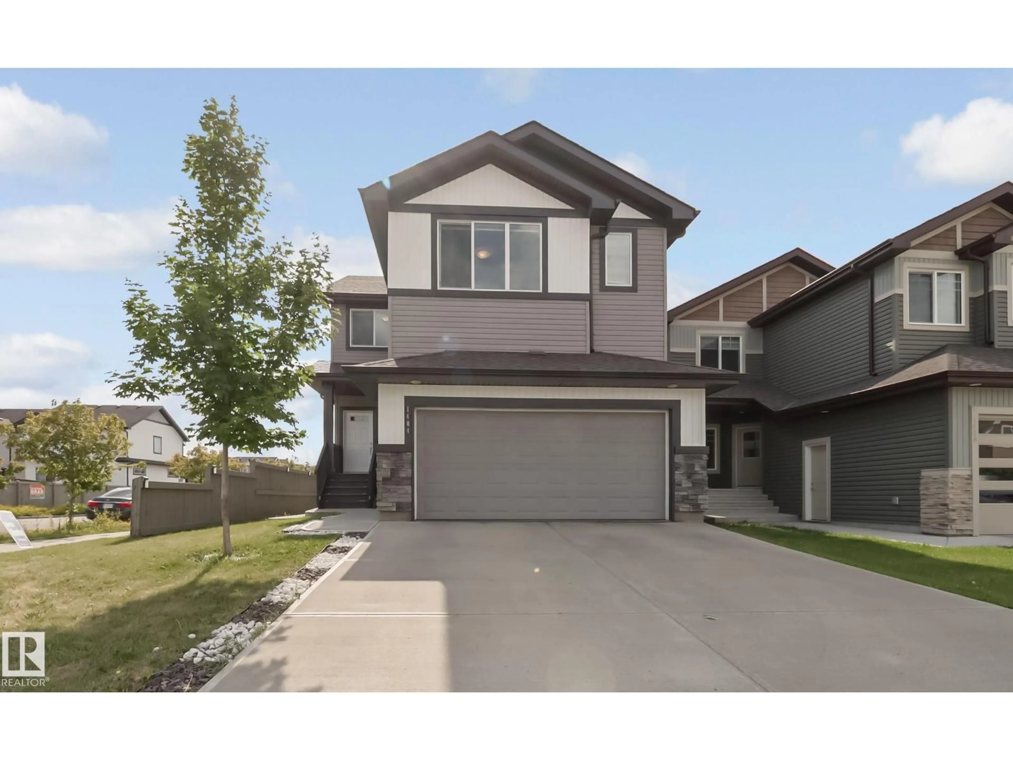 Home with vinyl exterior material, street for NW - 1404 29 ST, Edmonton Alberta T6T1A8