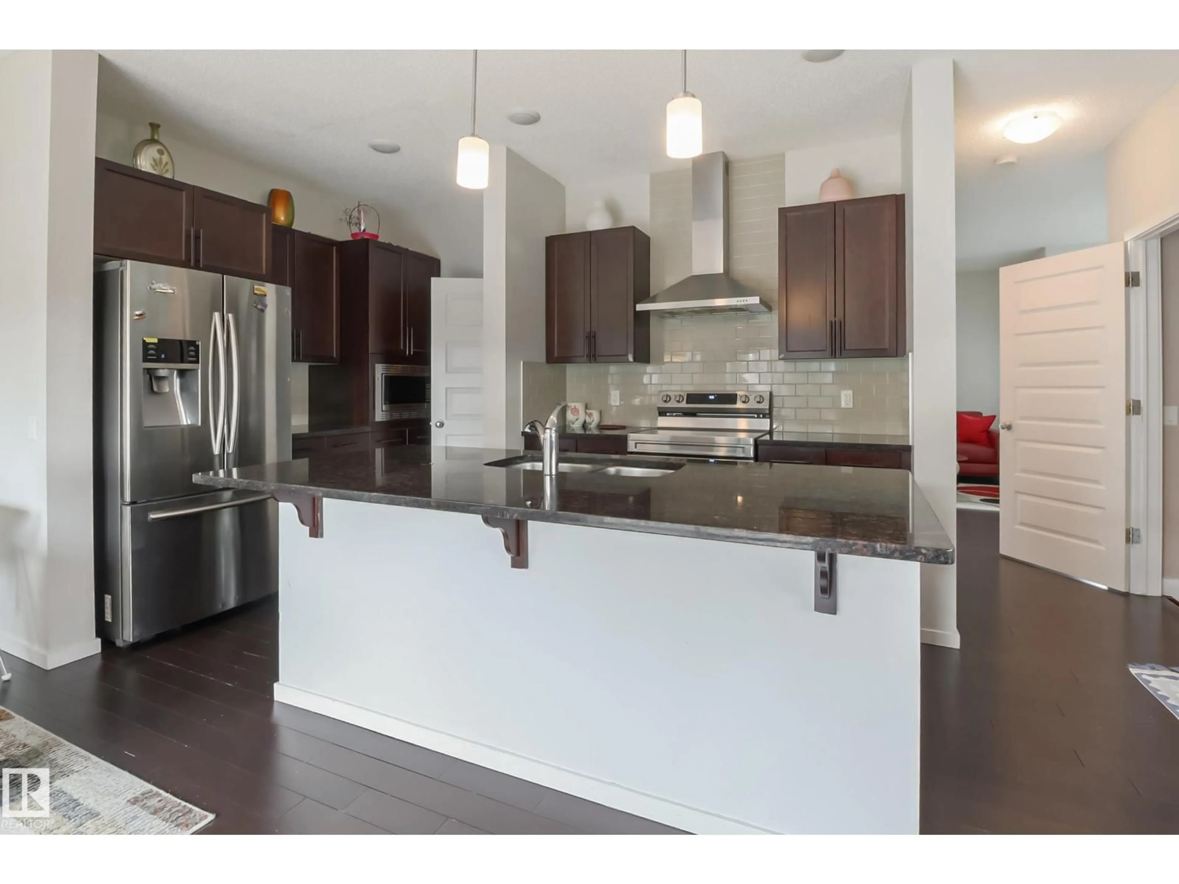 Open concept kitchen, unknown for NW - 1404 29 ST, Edmonton Alberta T6T1A8
