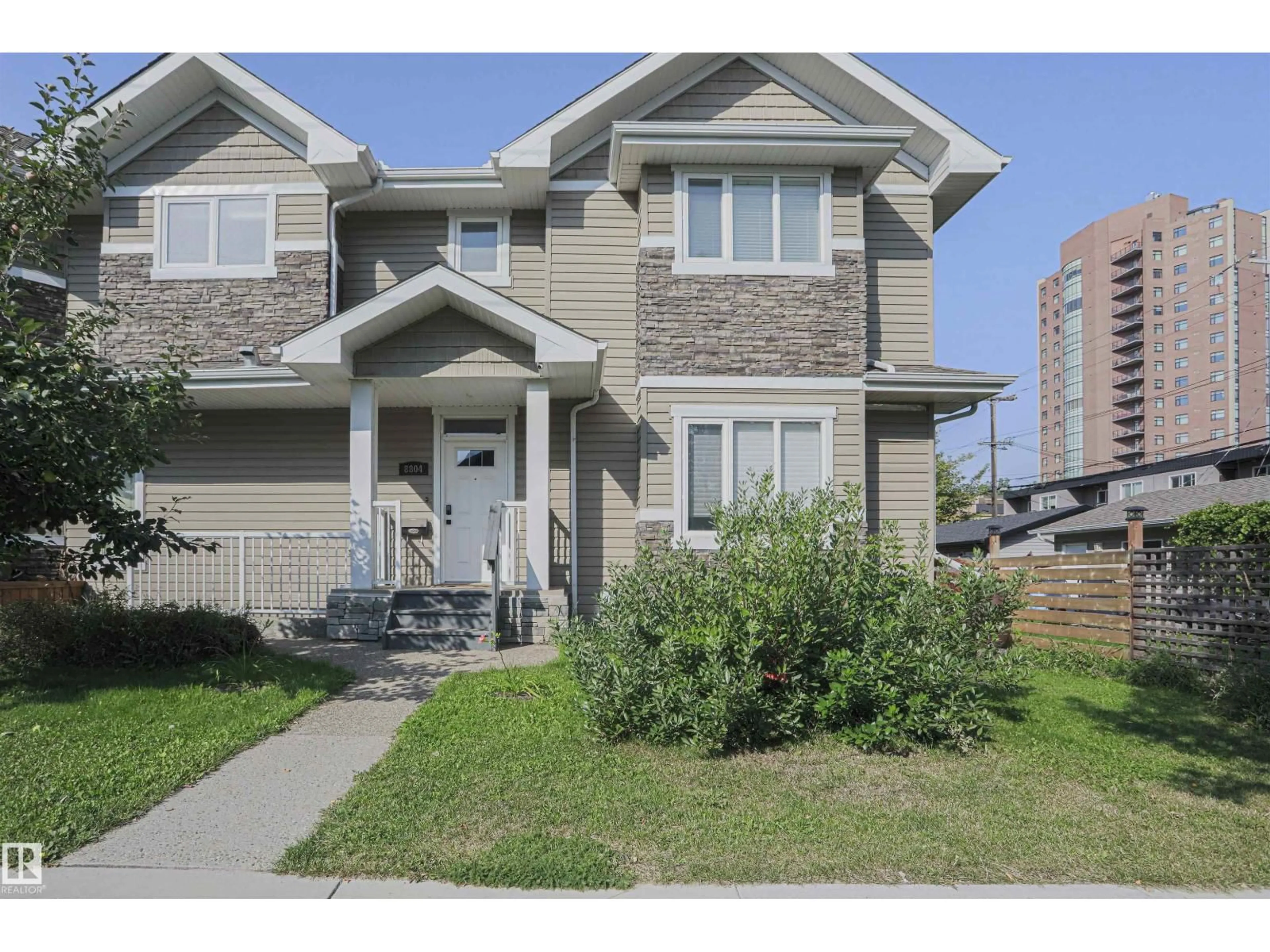 Home with vinyl exterior material, street for NW - 8804 100 ST, Edmonton Alberta T6E2R7