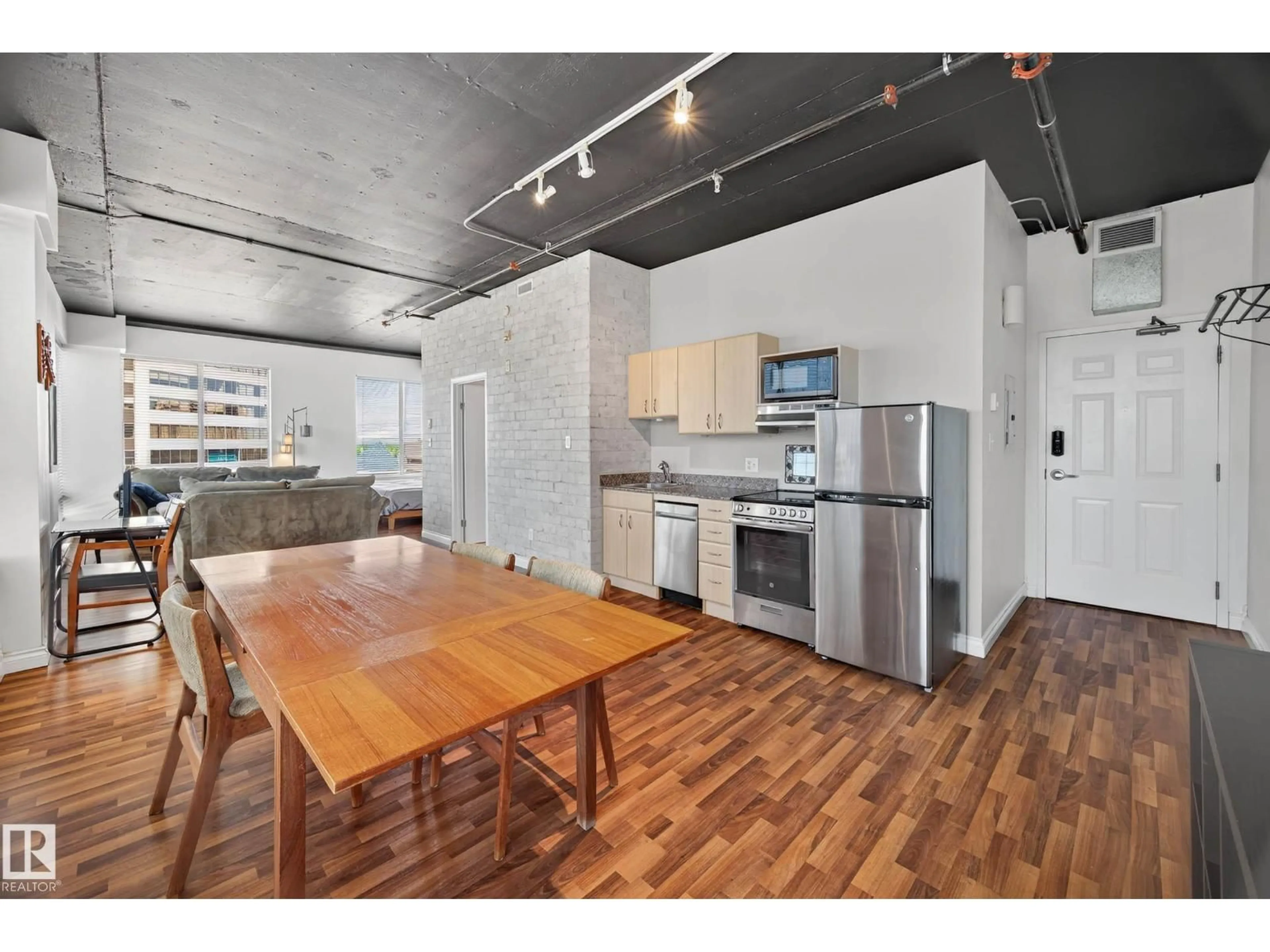 Open concept kitchen, unknown for 1205 JASPER AV, Edmonton Alberta T5J1R9