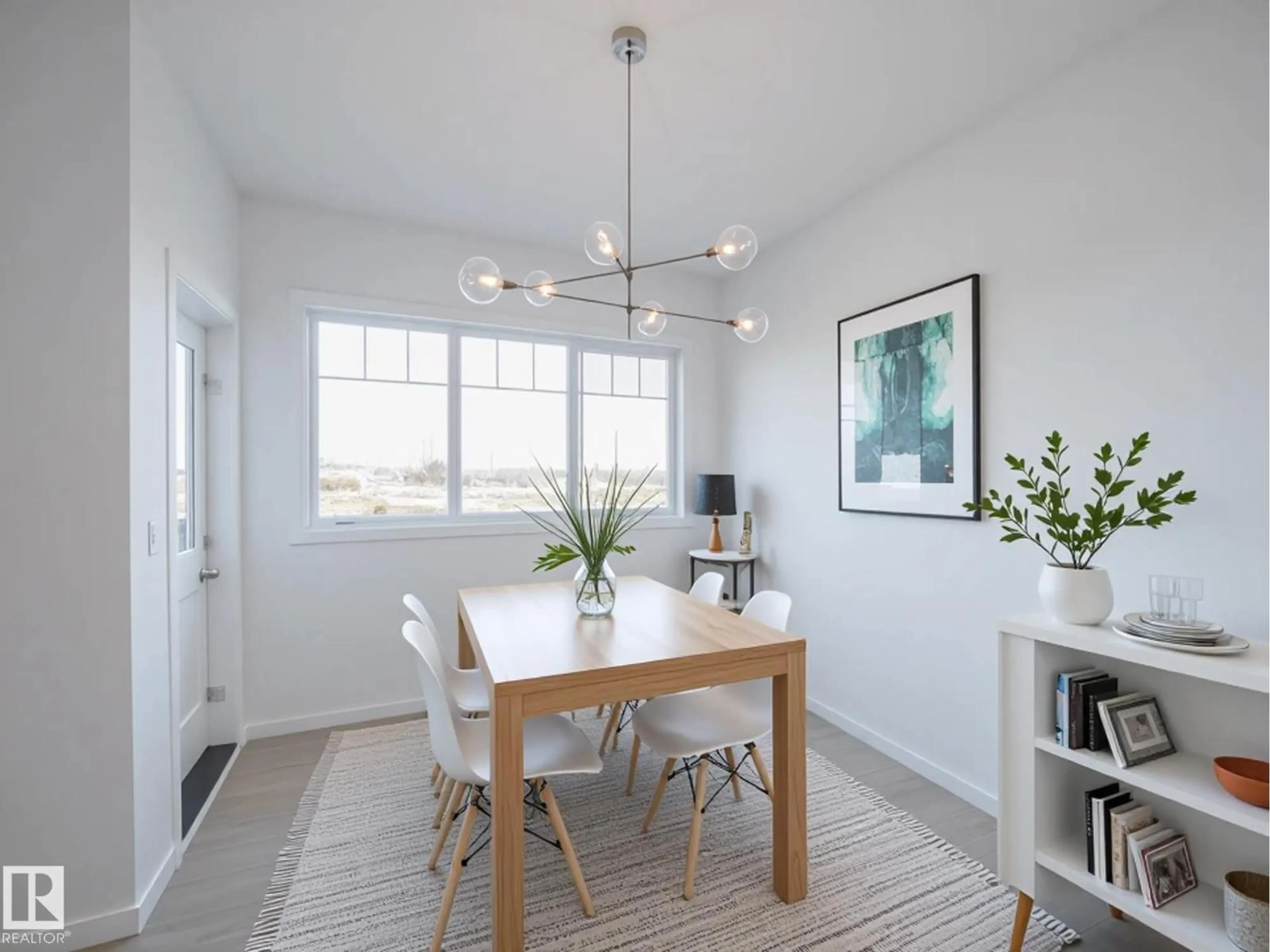 Dining room, wood/laminate floor for 17443 2 ST, Edmonton Alberta T5Y4G6