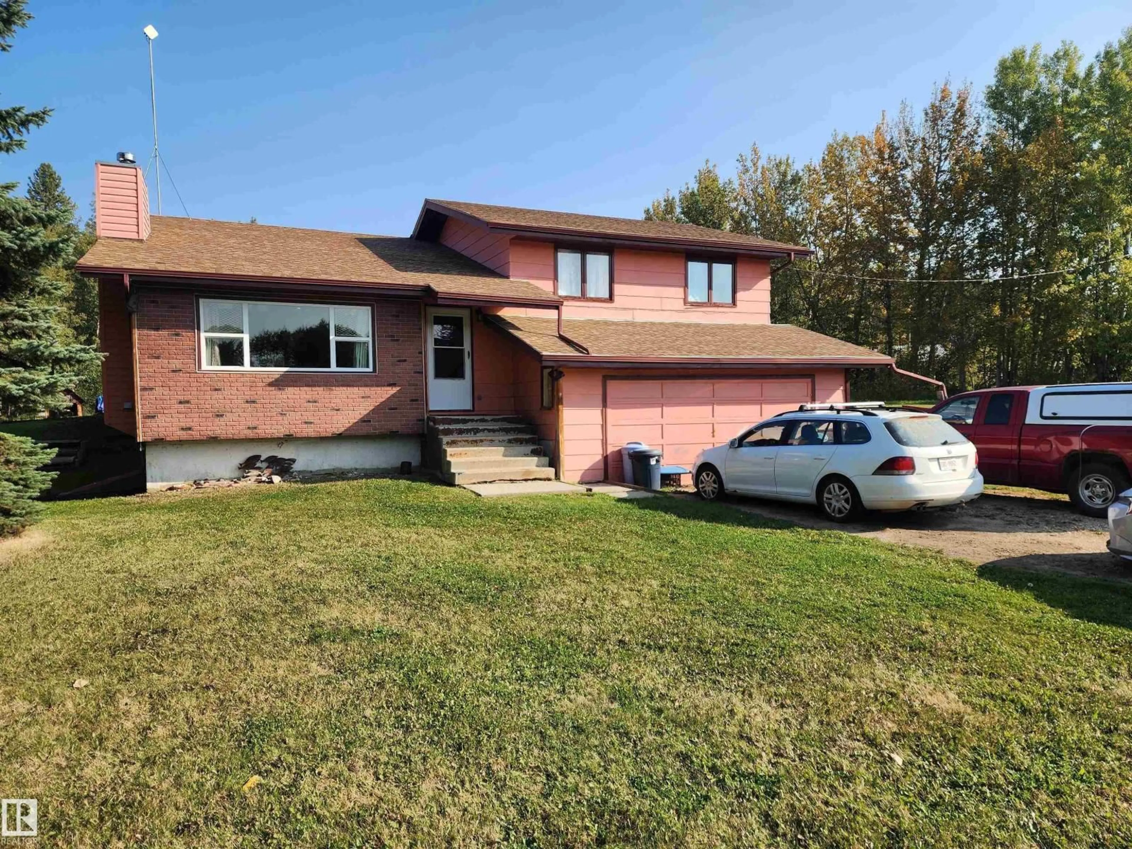 Home with vinyl exterior material, street for 53510 - 14 HWY 43, Rural Lac Ste. Anne County Alberta T0E1V0