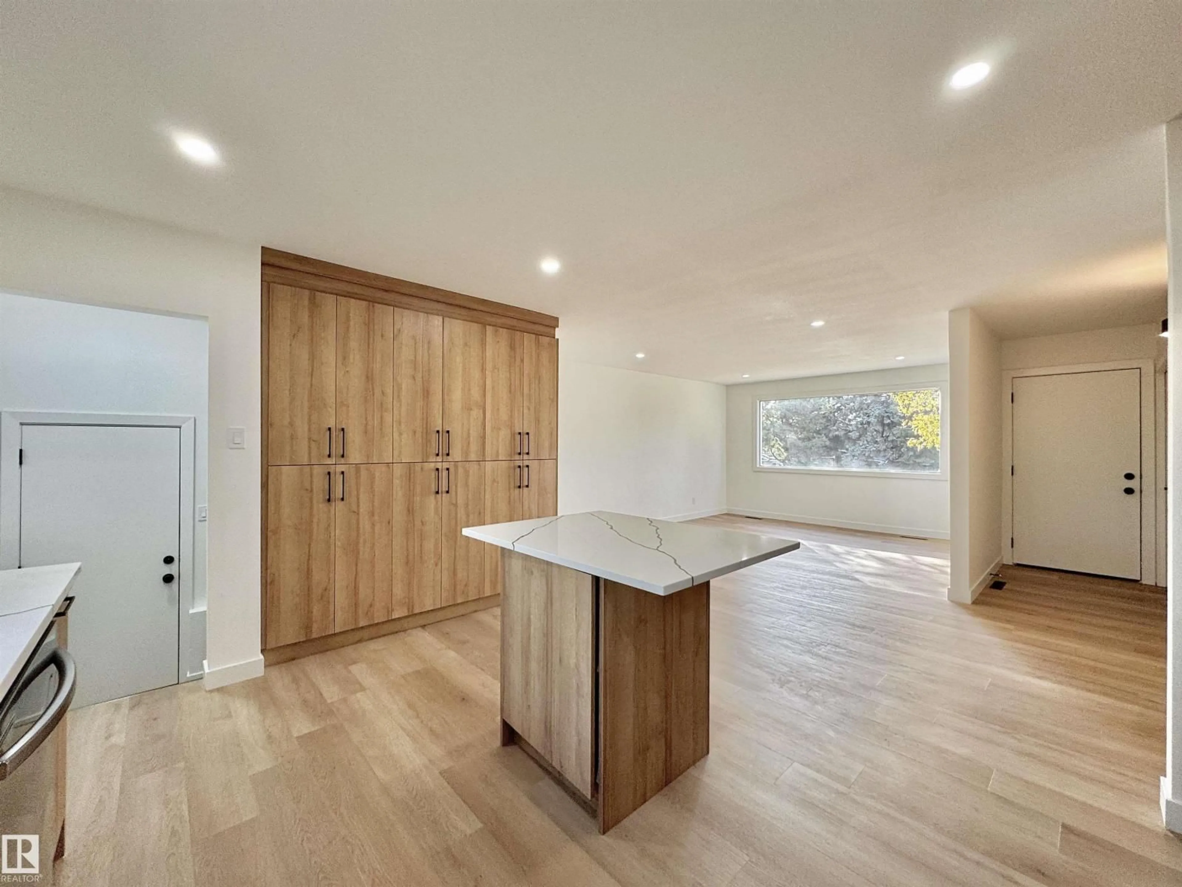 Open concept kitchen, wood/laminate floor for 12 SYCAMORE ST, Sherwood Park Alberta T8A2B9