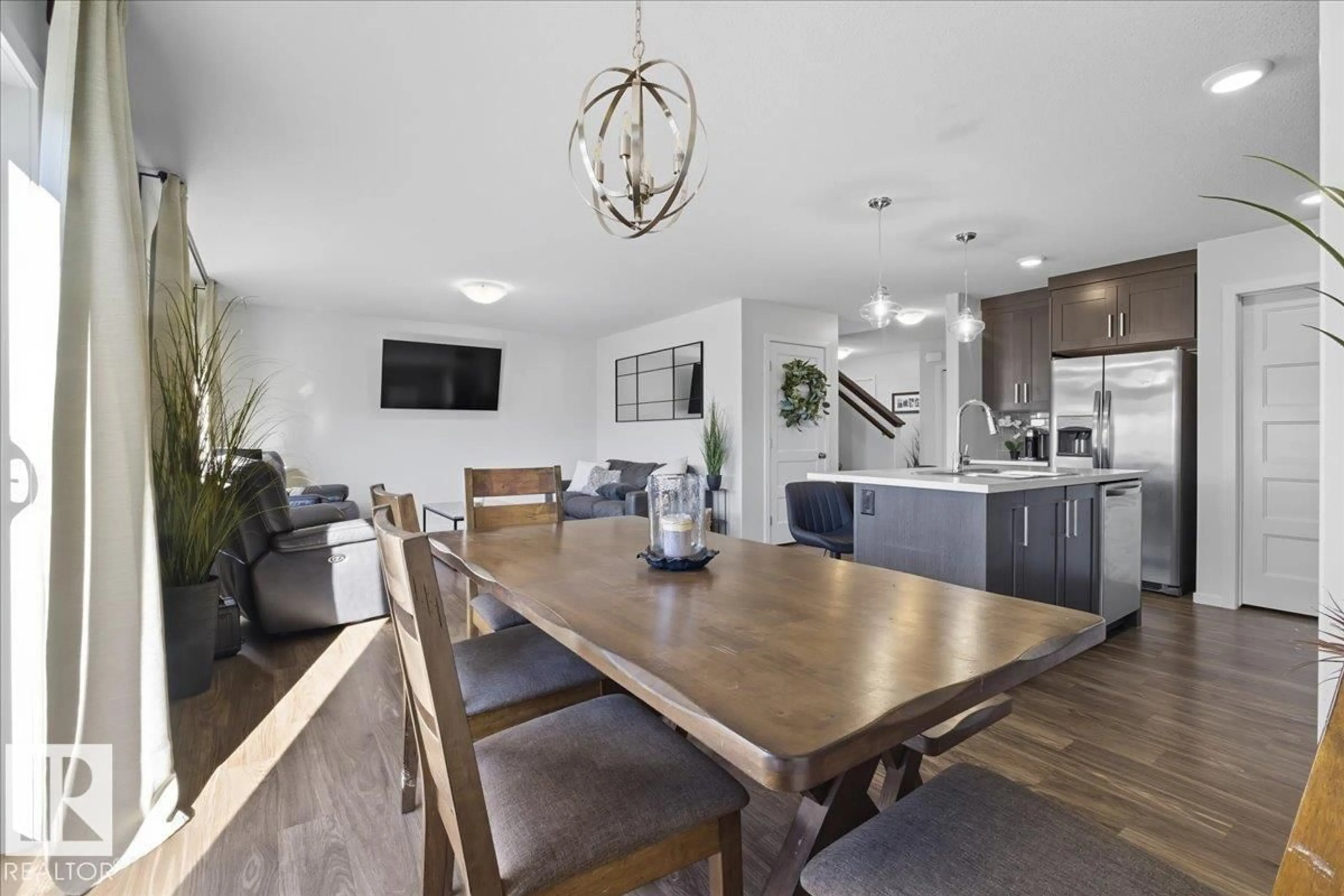 Open concept kitchen, wood/laminate floor for 113 PARK GV, Wetaskiwin Alberta T9A1X5