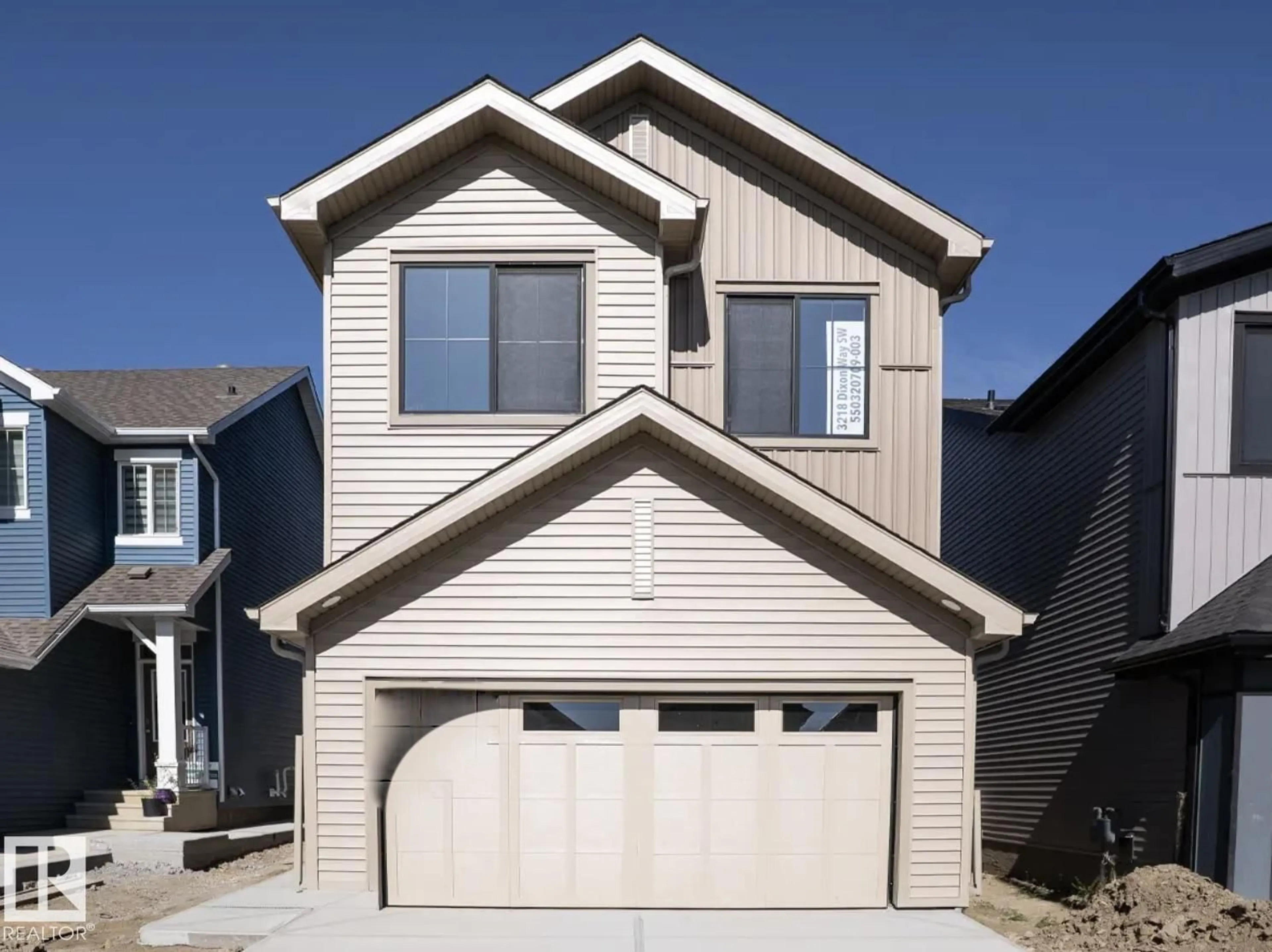 Home with vinyl exterior material, street for 3218 DIXON WY, Edmonton Alberta T6W5L3
