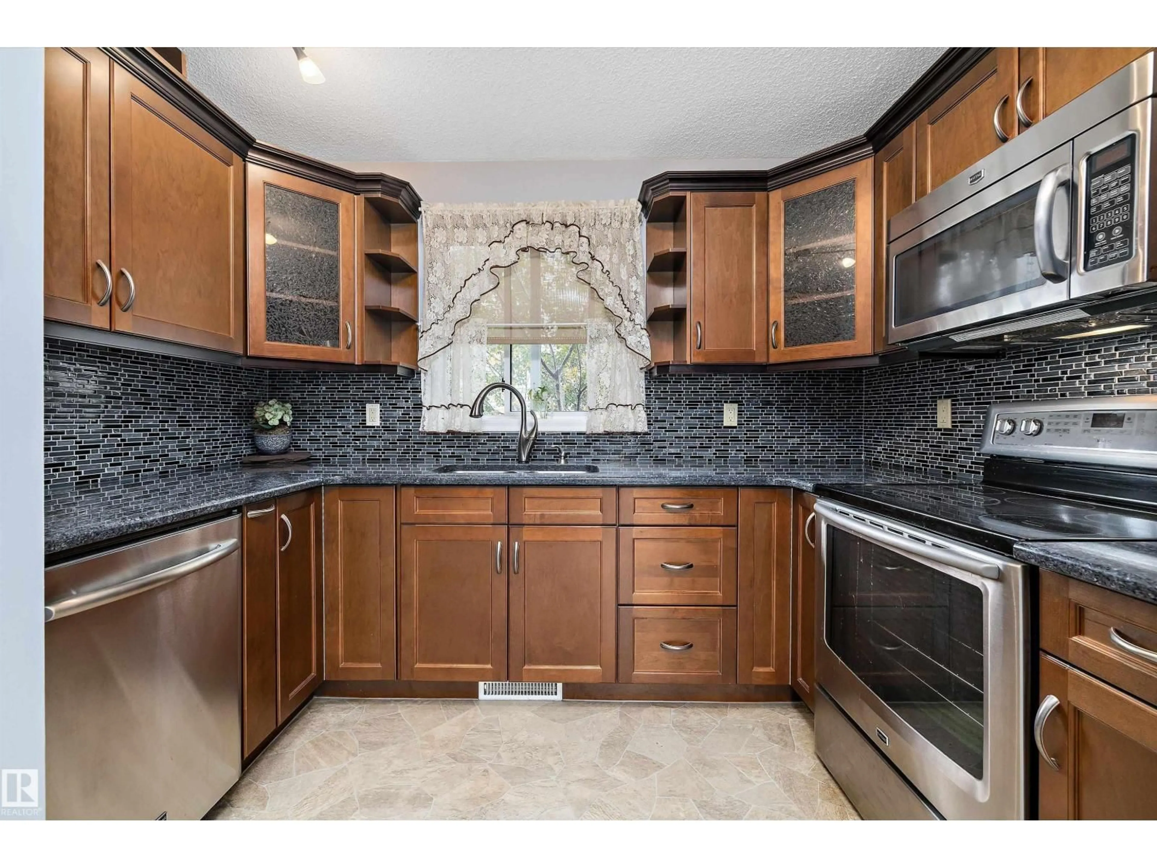 Standard kitchen, ceramic/tile floor for 4420 36A ST, Edmonton Alberta T6L6K5