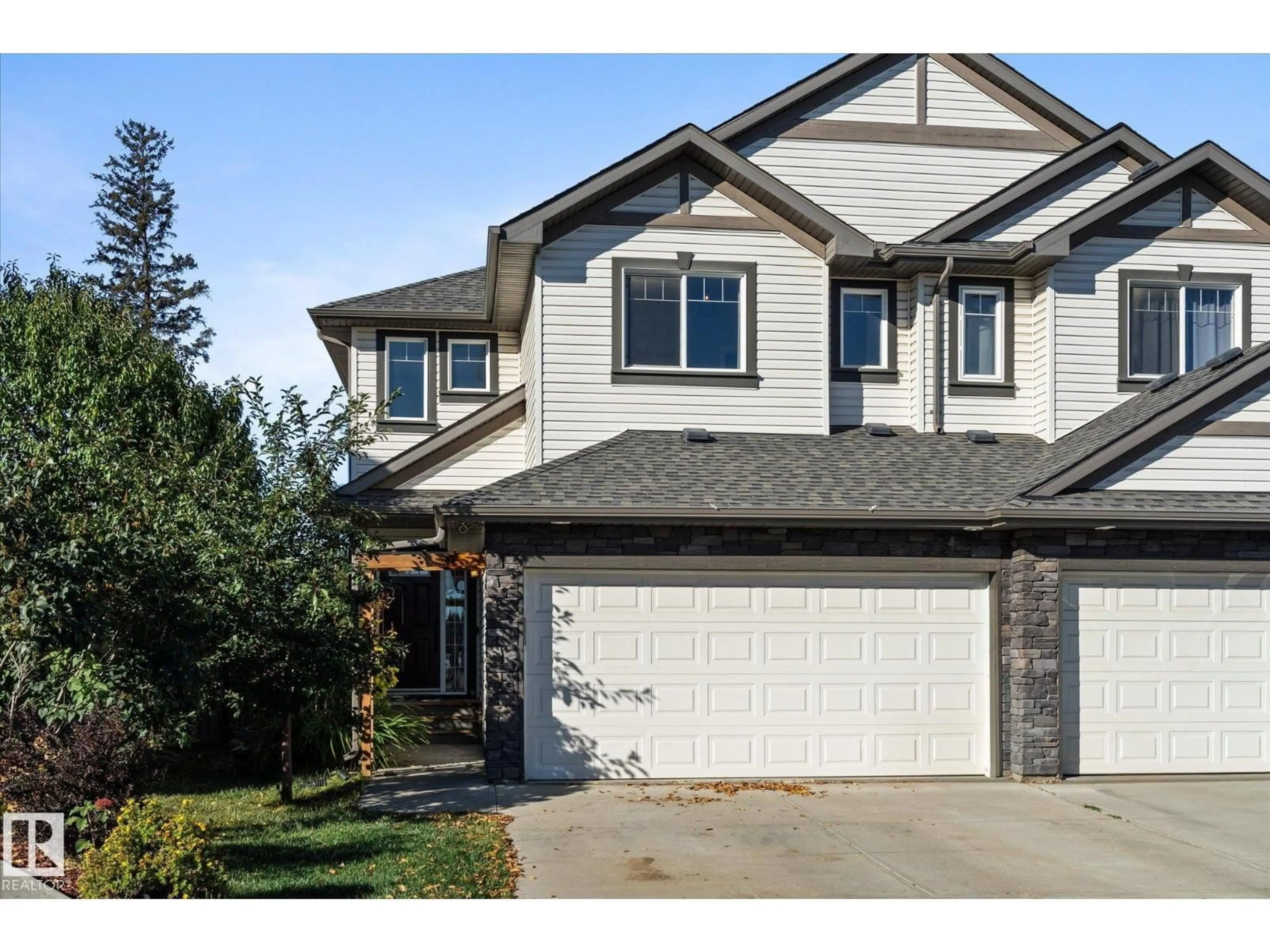 Home with vinyl exterior material, street for 41 MEADOWLAND CR, Spruce Grove Alberta T7X0P9