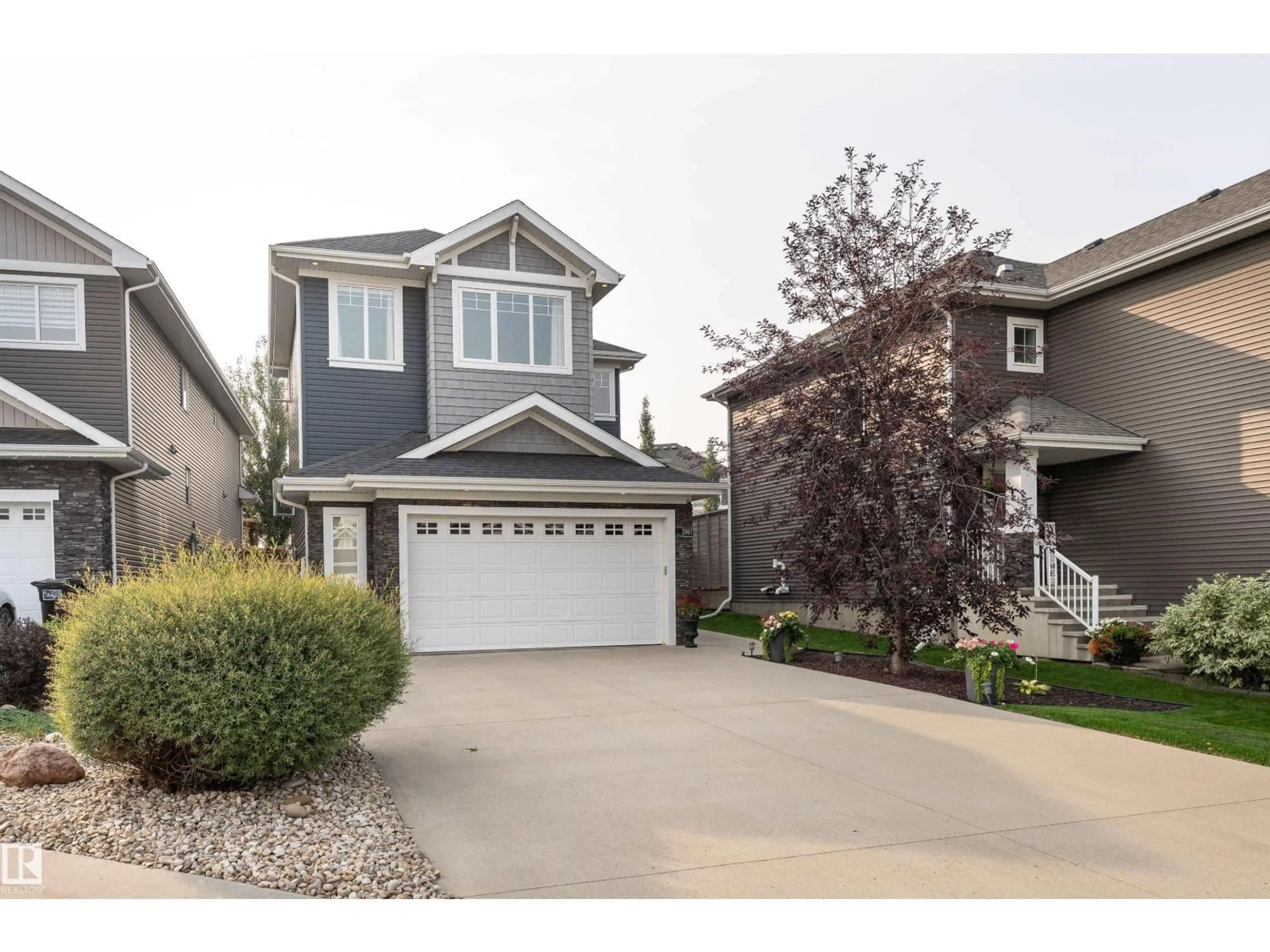 Home with vinyl exterior material, street for 2007 BLUE JAY CO, Edmonton Alberta T5S0J8