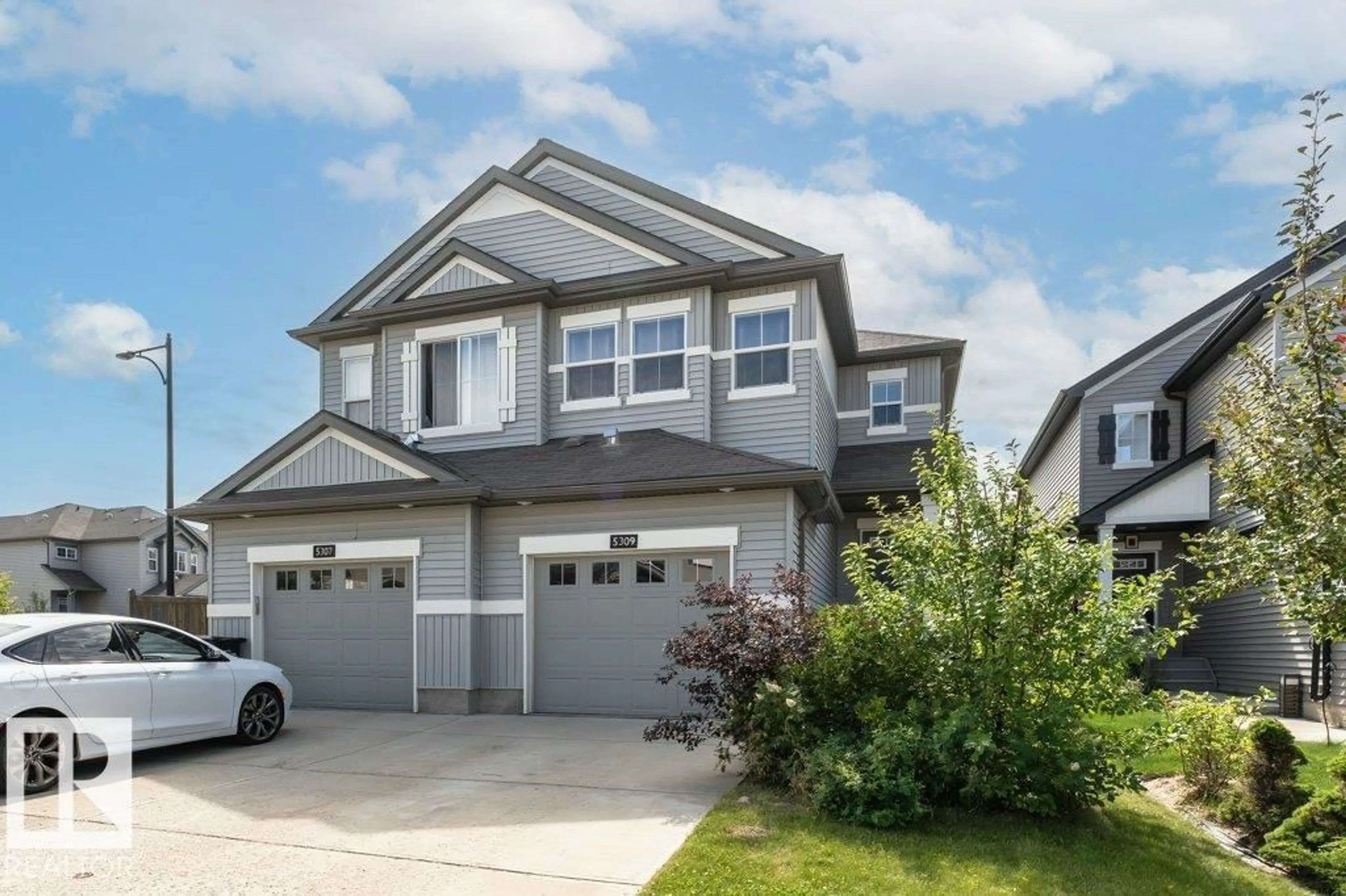 Home with vinyl exterior material, street for 5309 14 AV, Edmonton Alberta T6X1S2