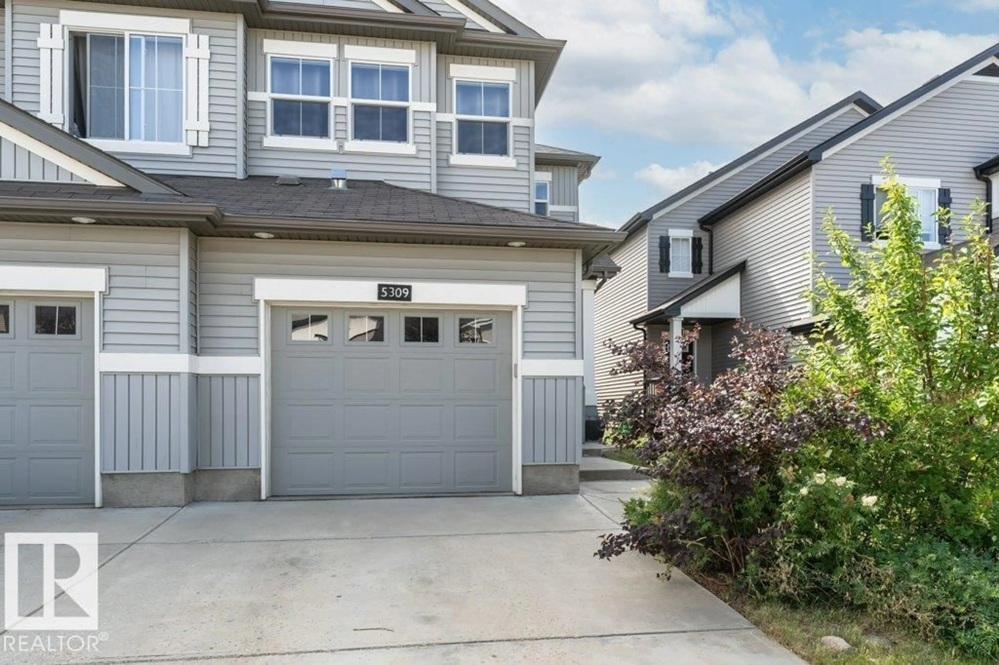 Home with vinyl exterior material, street for 5309 14 AV, Edmonton Alberta T6X1S2