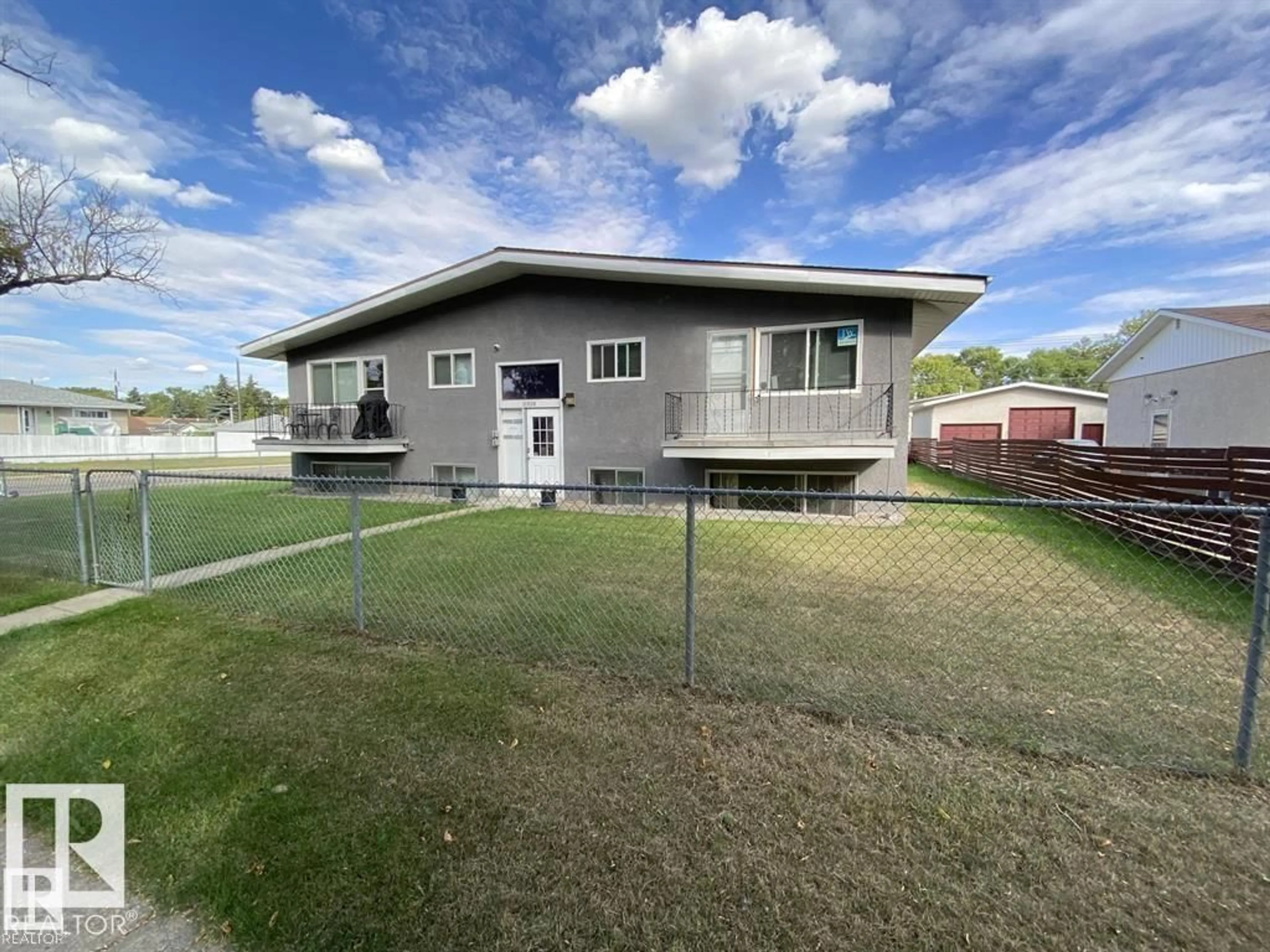 A pic from outside/outdoor area/front of a property/back of a property/a pic from drone, unknown for NW - 11839 45 ST, Edmonton Alberta T5W2T3