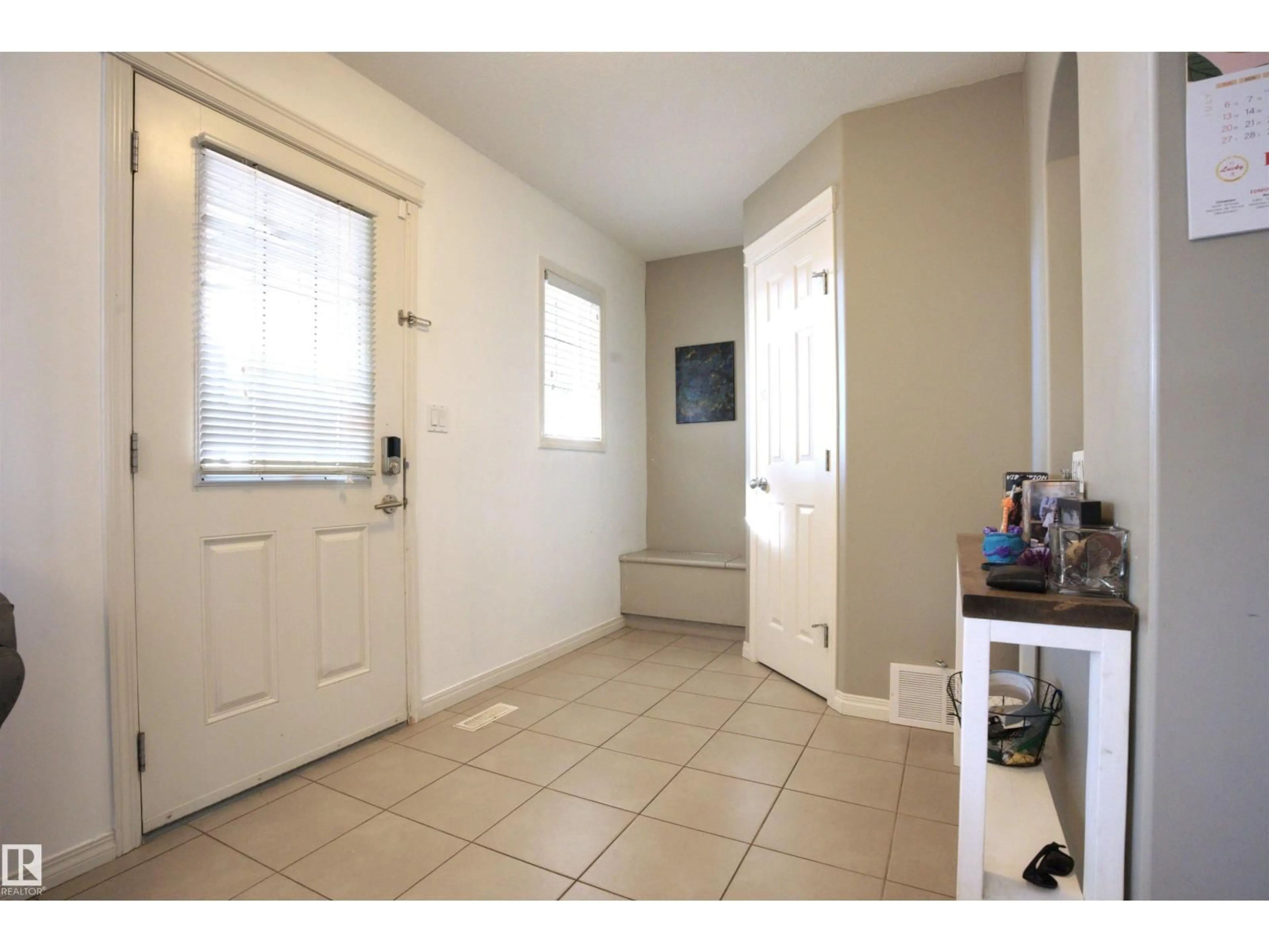 Indoor entryway for 9328 107 AV, Edmonton Alberta T5H0T5