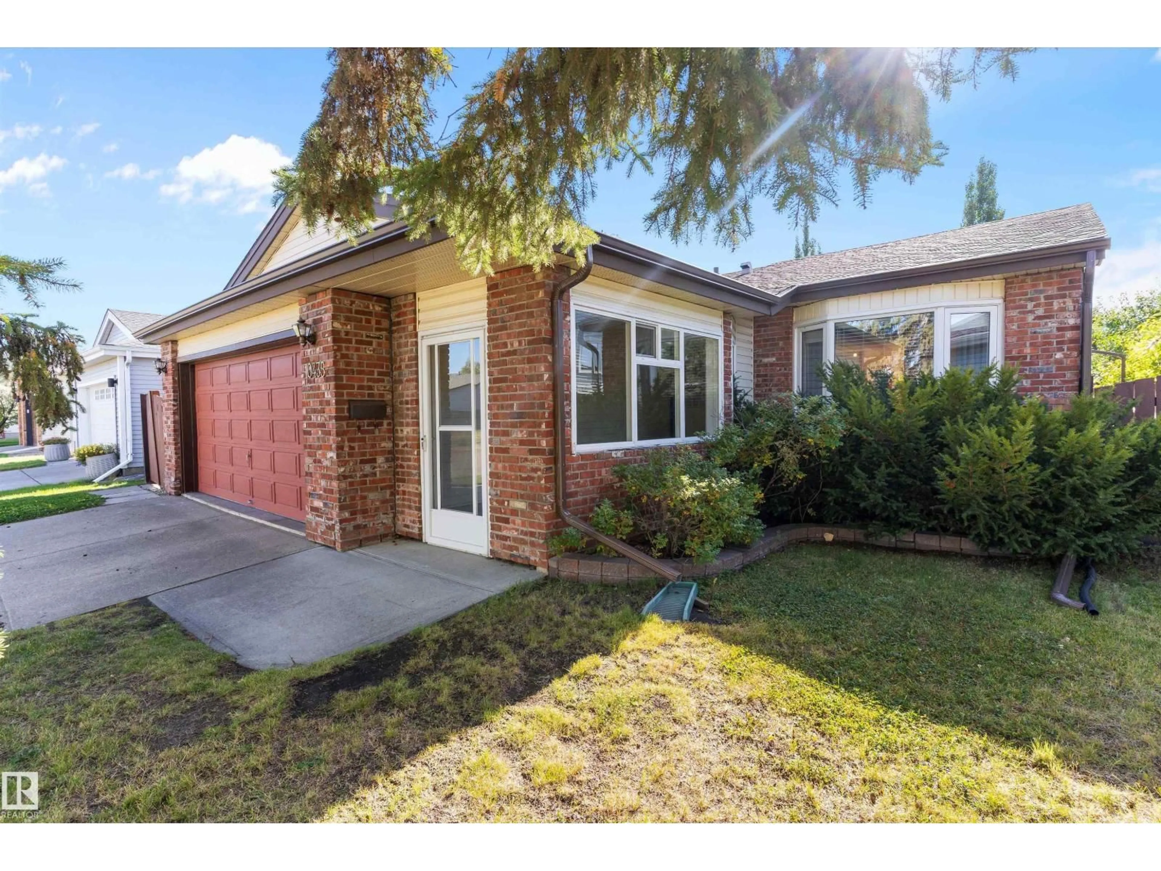 Home with brick exterior material, street for 10435 14 AV, Edmonton Alberta T6J5R7