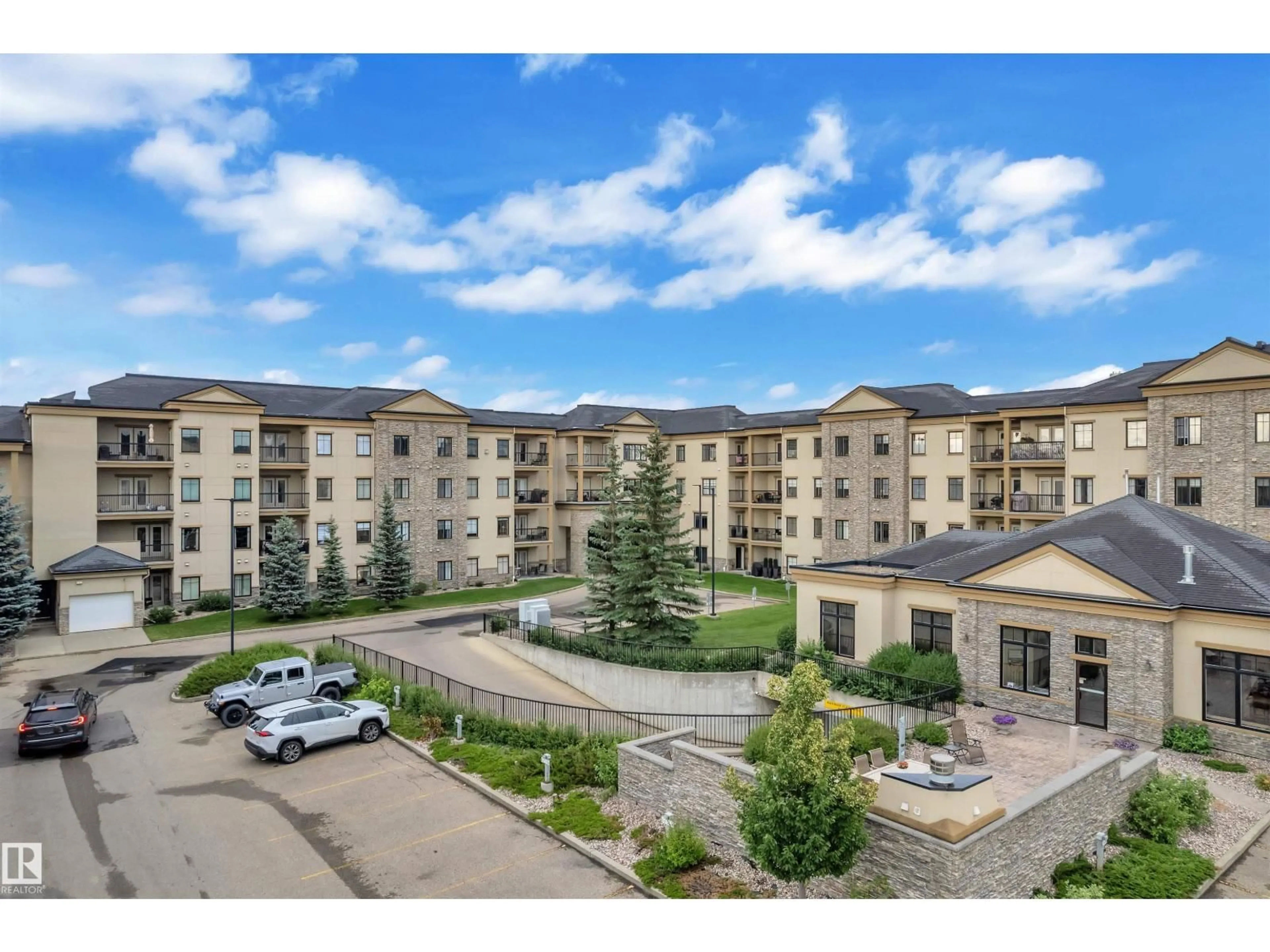 A pic from outside/outdoor area/front of a property/back of a property/a pic from drone, mountain view for 160 MAGRATH ROAD NW, Edmonton Alberta T6R3T7