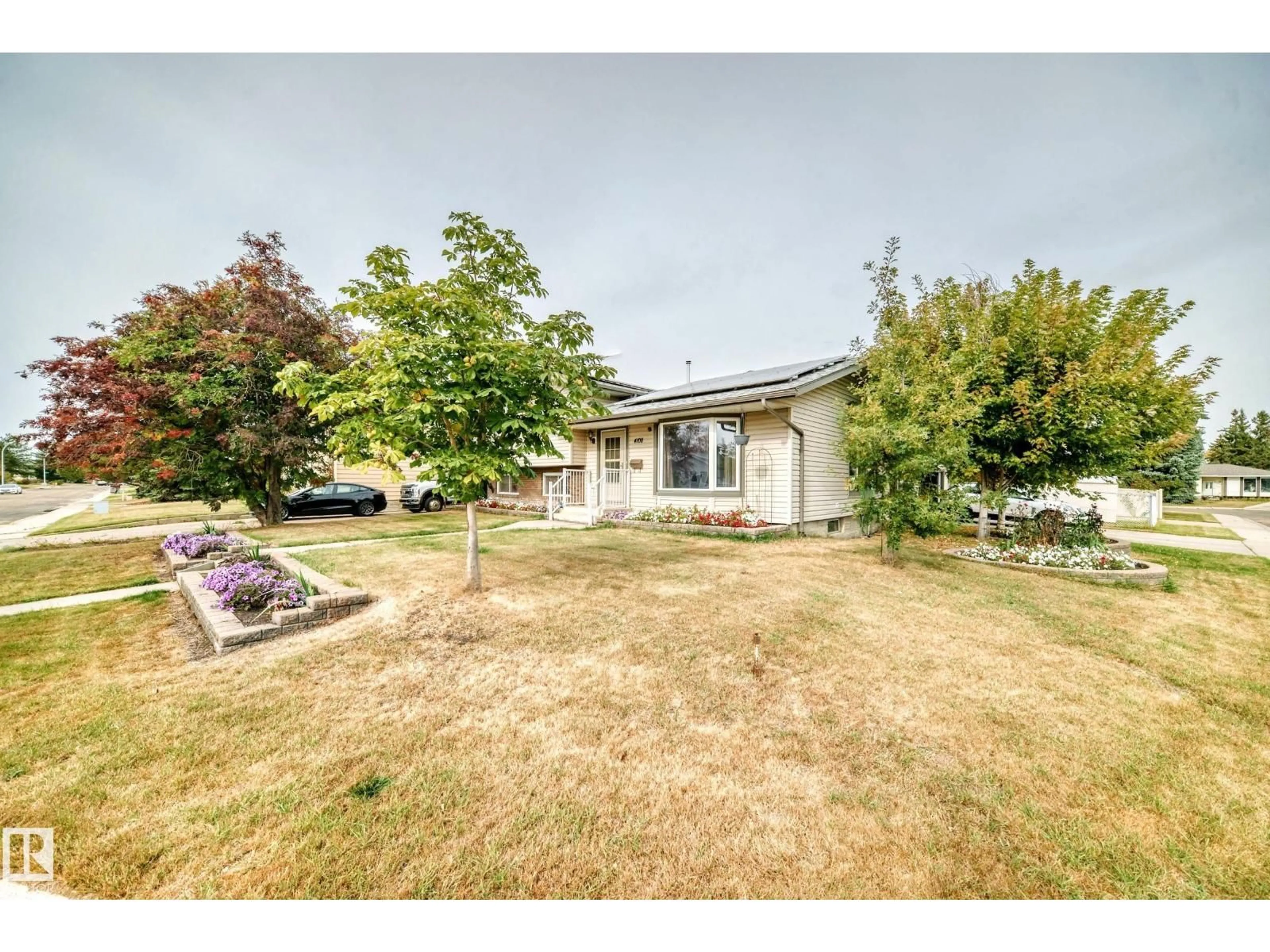 A pic from outside/outdoor area/front of a property/back of a property/a pic from drone, street for 4108 135 AV, Edmonton Alberta T5A2N7