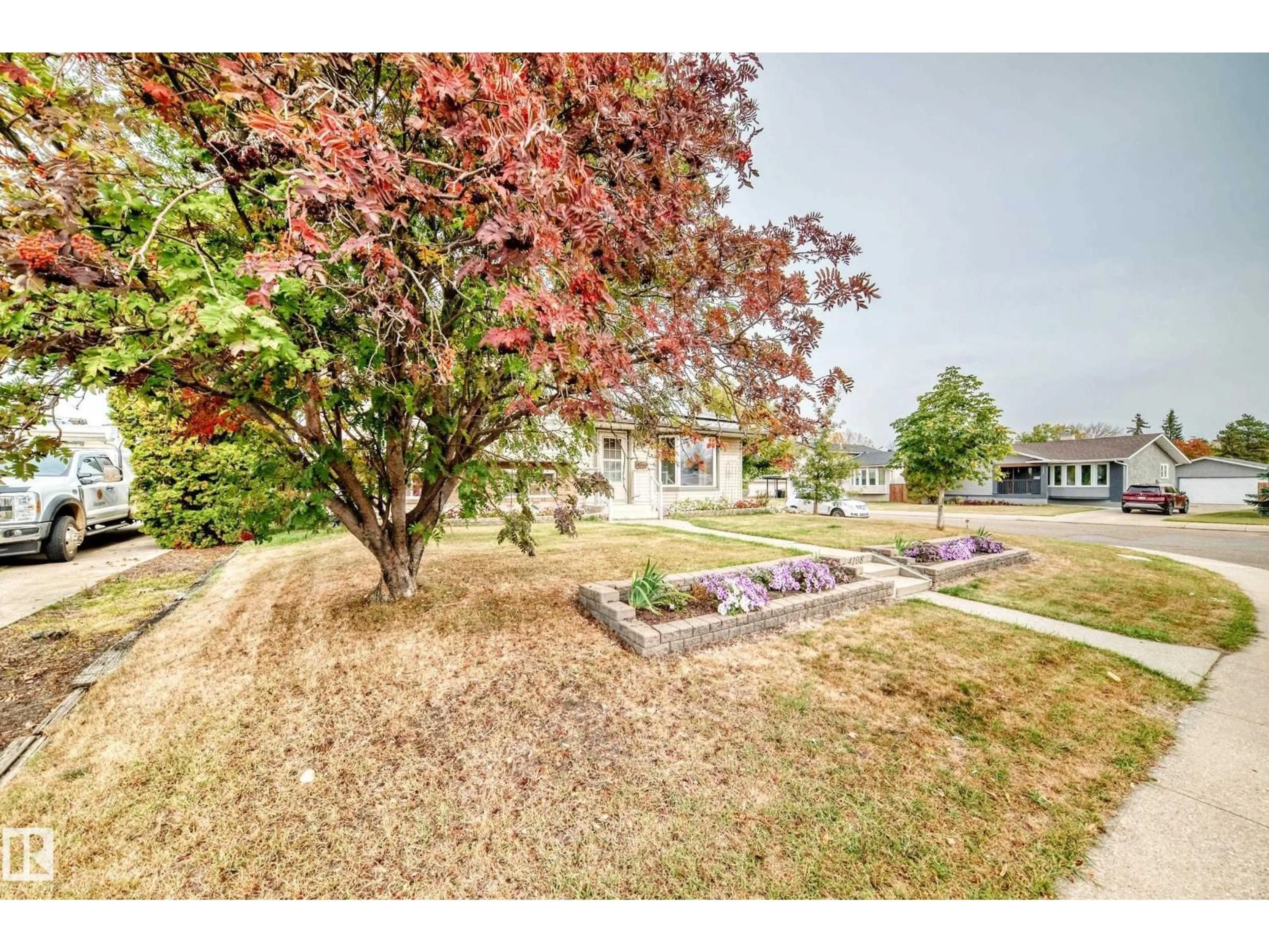 A pic from outside/outdoor area/front of a property/back of a property/a pic from drone, street for 4108 135 AV, Edmonton Alberta T5A2N7
