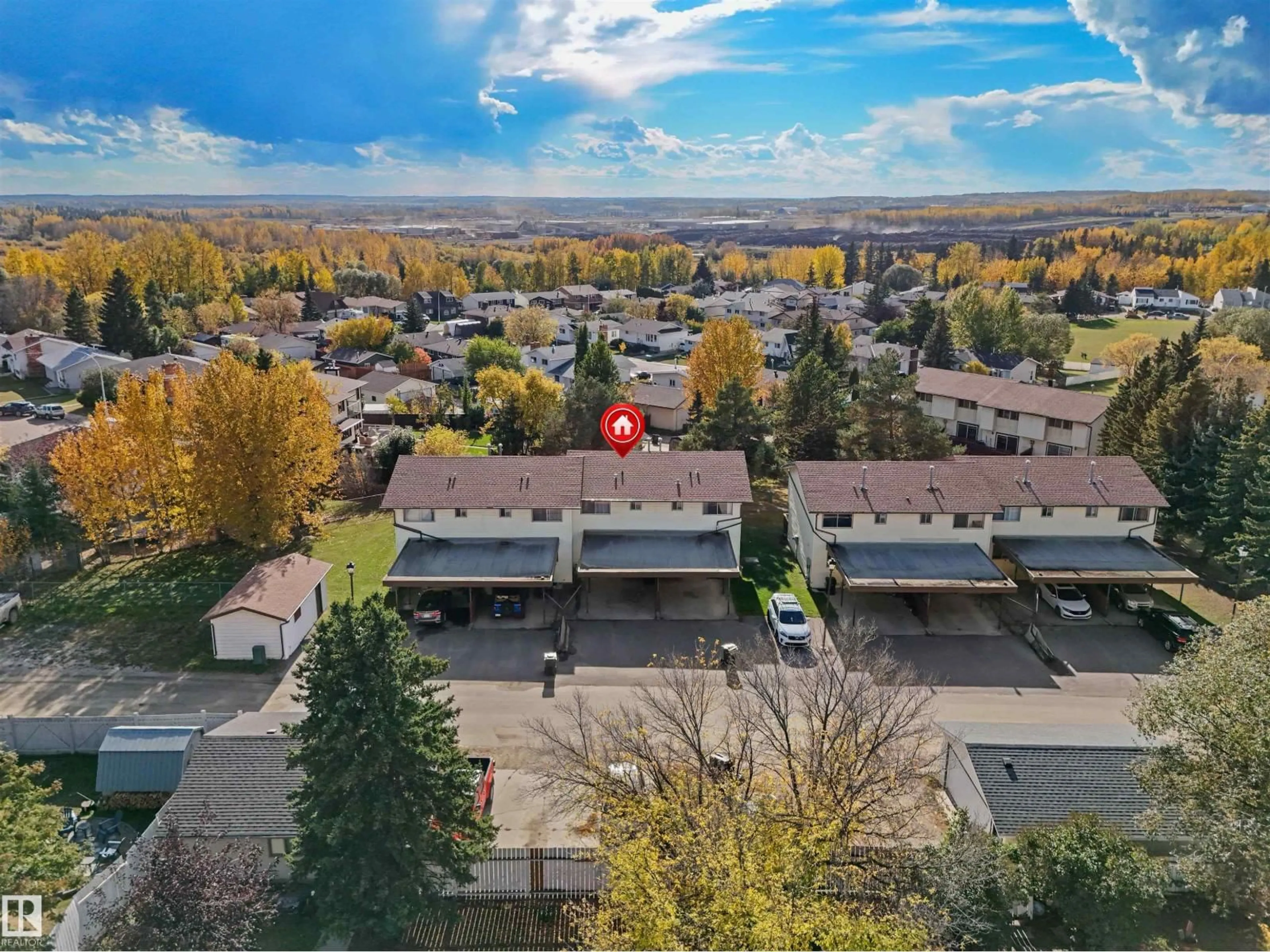 A pic from outside/outdoor area/front of a property/back of a property/a pic from drone, mountain view for 5415 45 AV, Drayton Valley Alberta T7A1K6