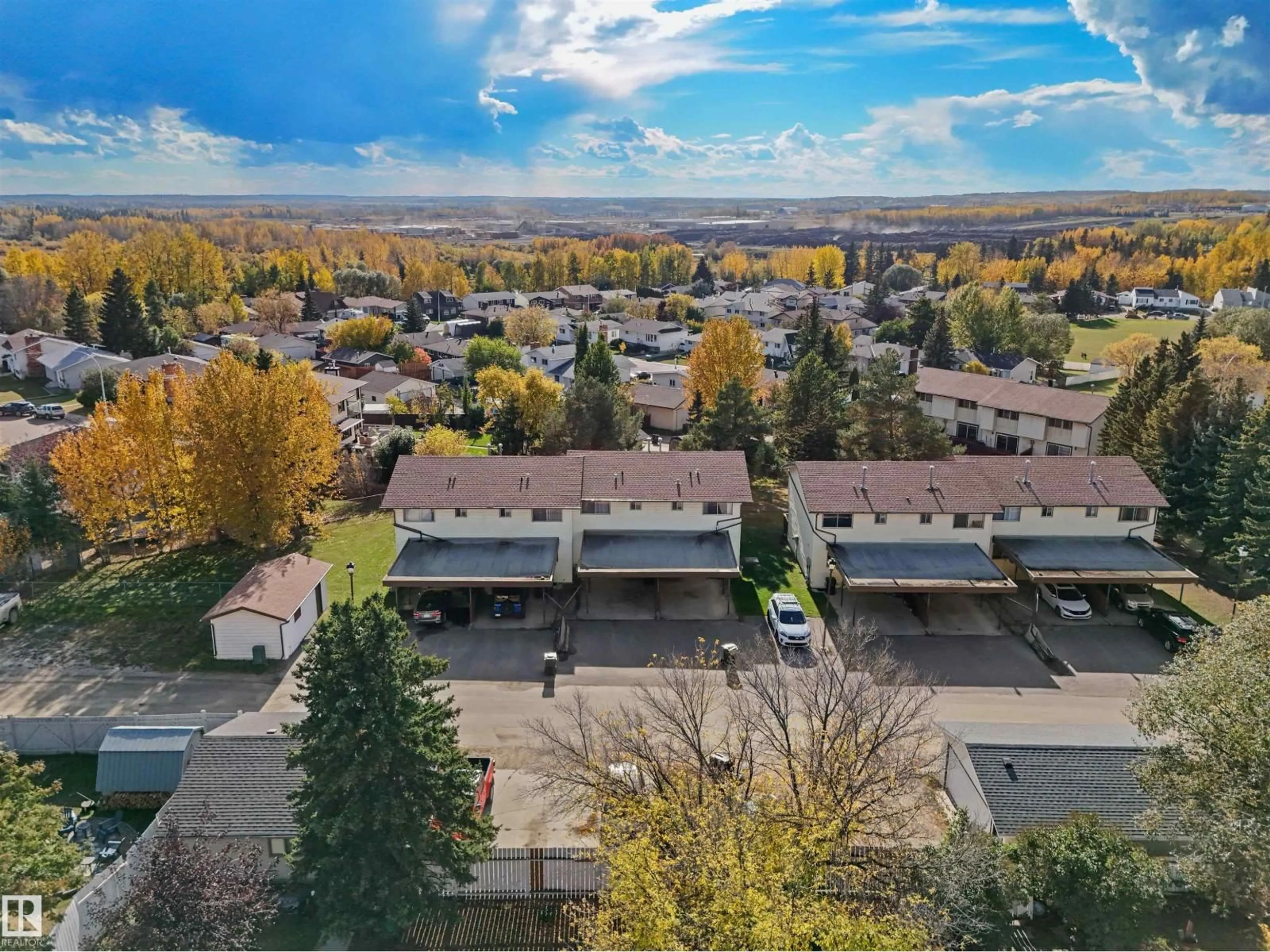 A pic from outside/outdoor area/front of a property/back of a property/a pic from drone, mountain view for 5415 45 AV, Drayton Valley Alberta T7A1K6