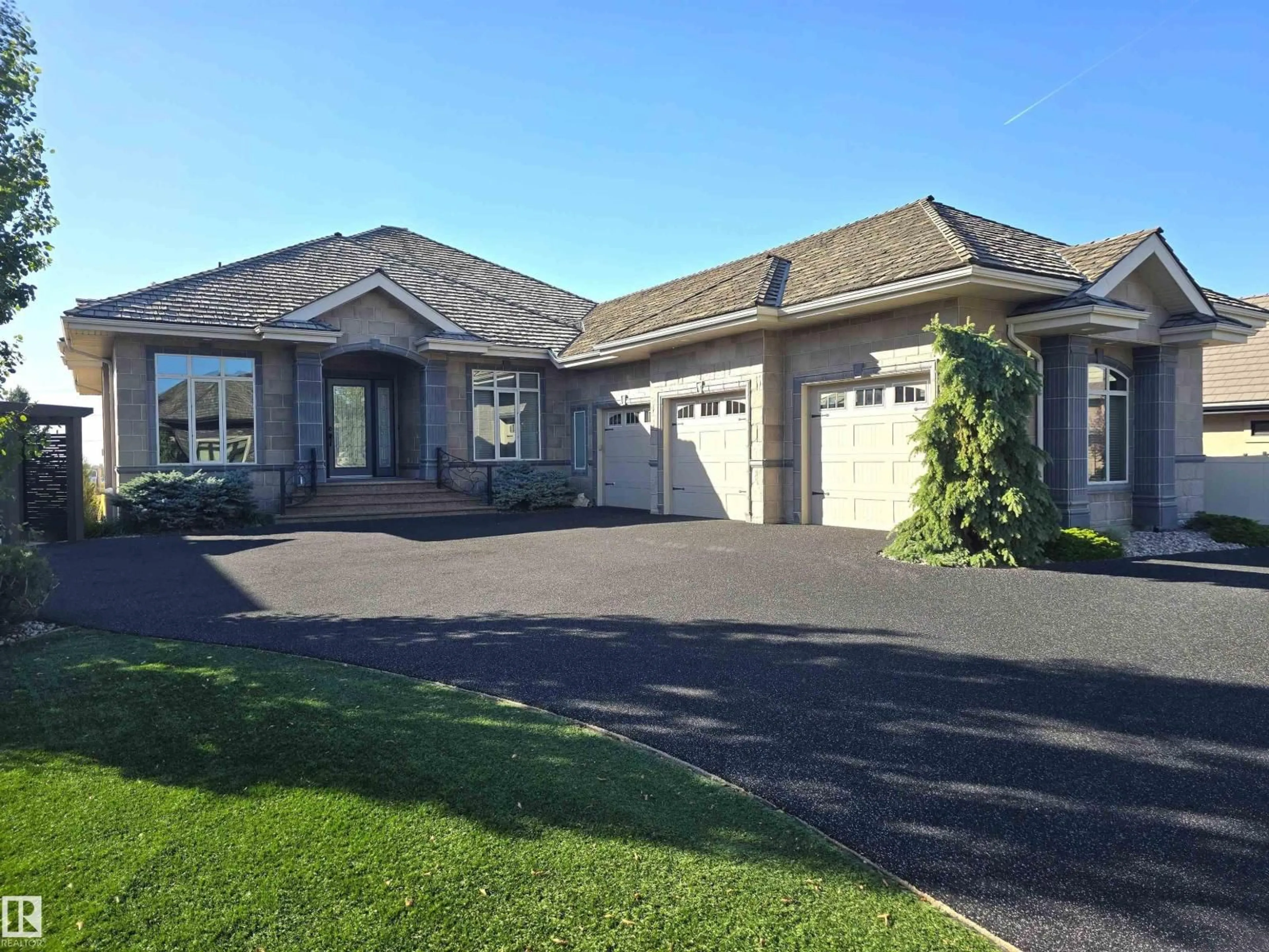 Home with vinyl exterior material, street for 491 52328 RGE ROAD 233, Rural Strathcona County Alberta T8B0A2