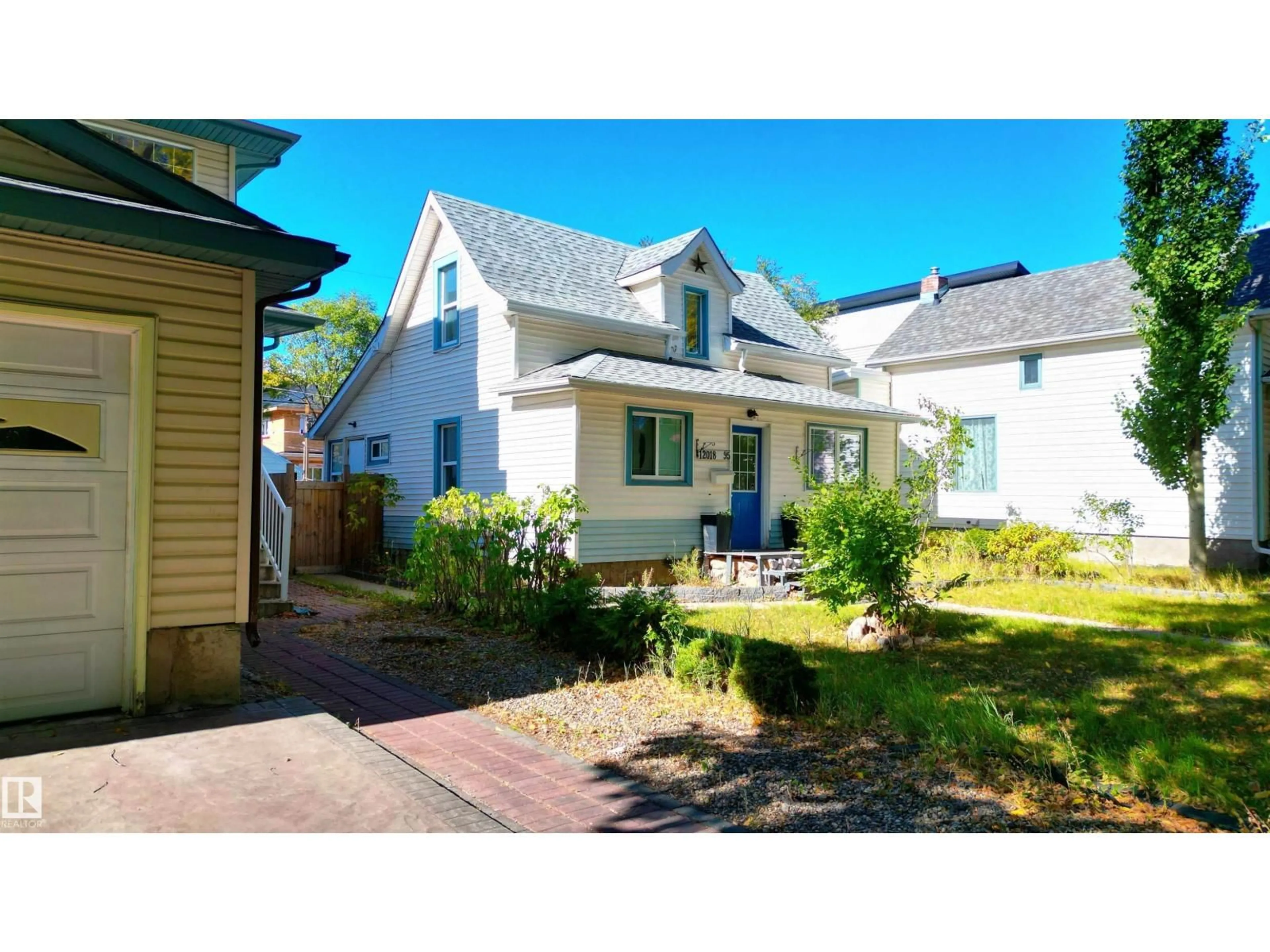 A pic from outside/outdoor area/front of a property/back of a property/a pic from drone, street for 12018 95 ST, Edmonton Alberta T5G1M7