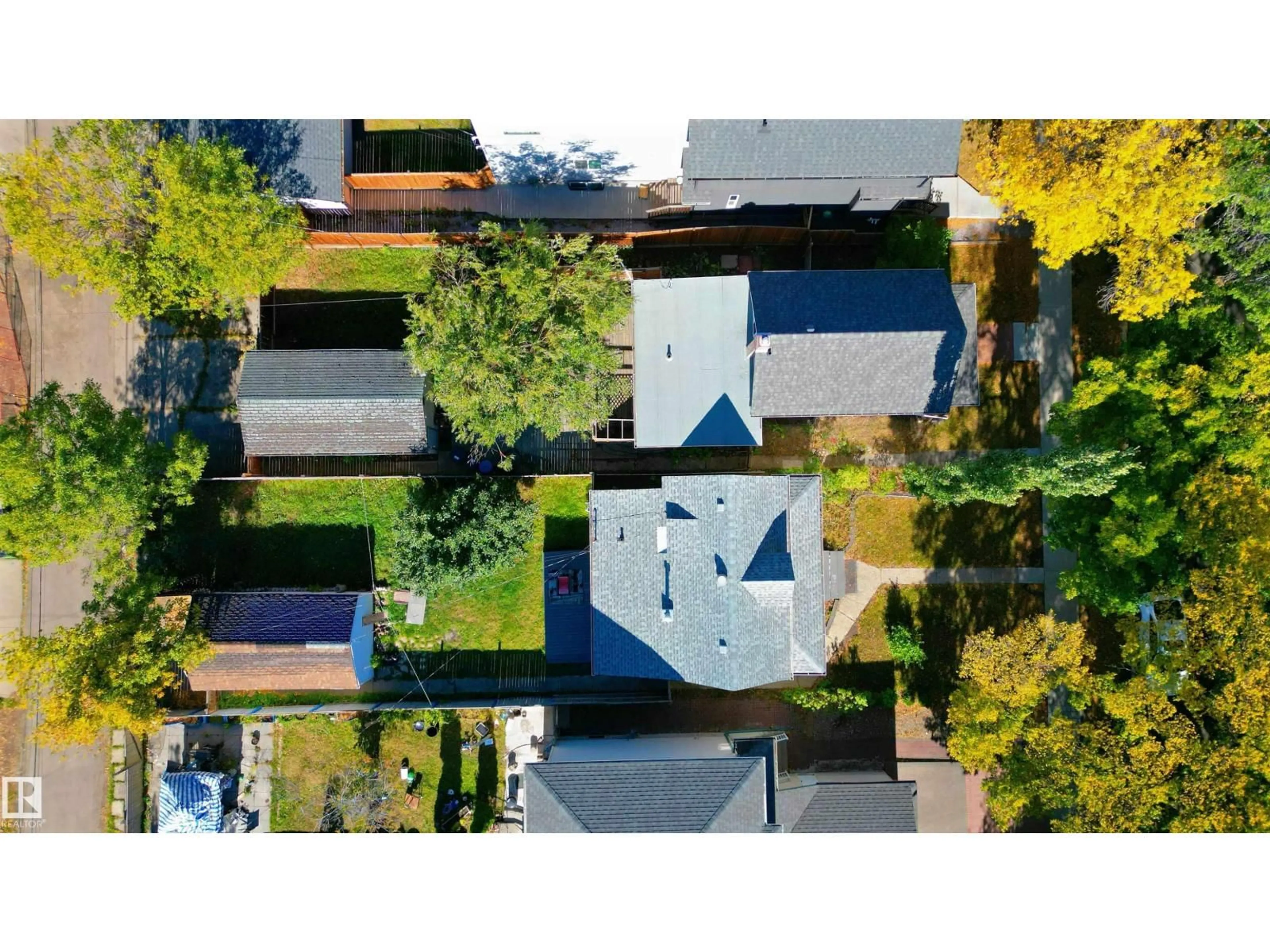 A pic from outside/outdoor area/front of a property/back of a property/a pic from drone, street for 12018 95 ST, Edmonton Alberta T5G1M7