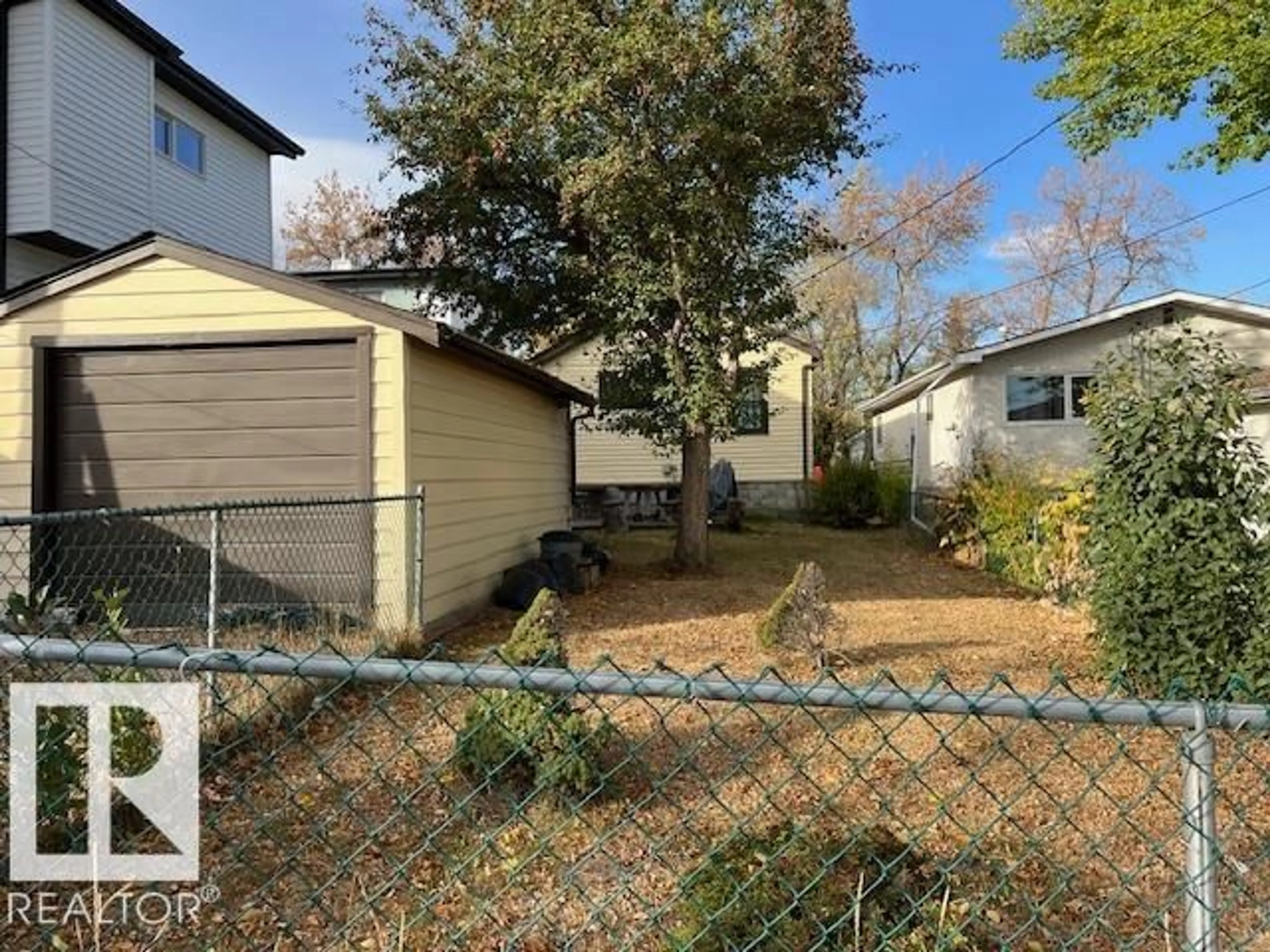 A pic from outside/outdoor area/front of a property/back of a property/a pic from drone, street for 11419 79 AV, Edmonton Alberta T6G0P5