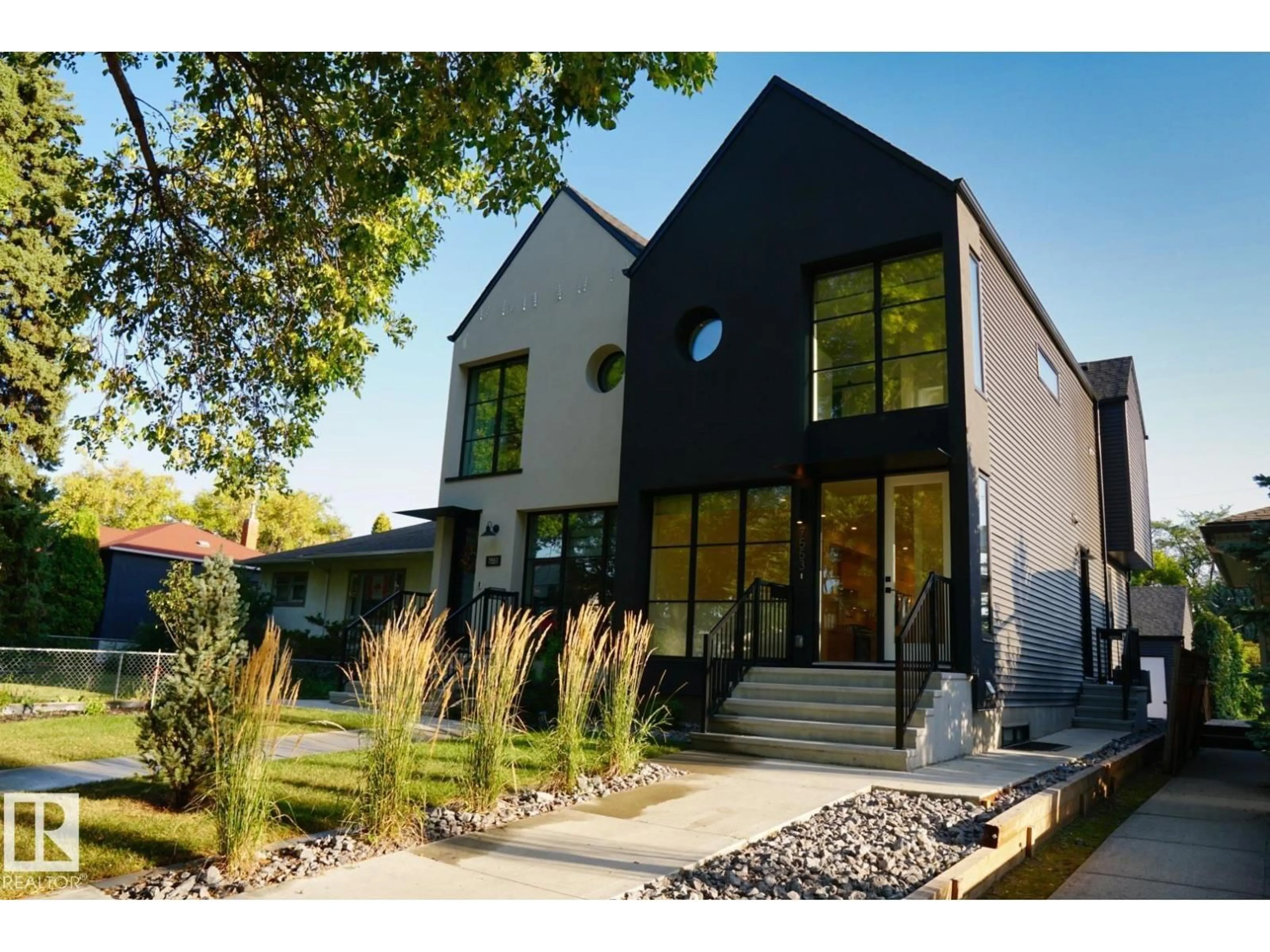 Home with brick exterior material, street for 7553 81 AV, Edmonton Alberta T6C0V4