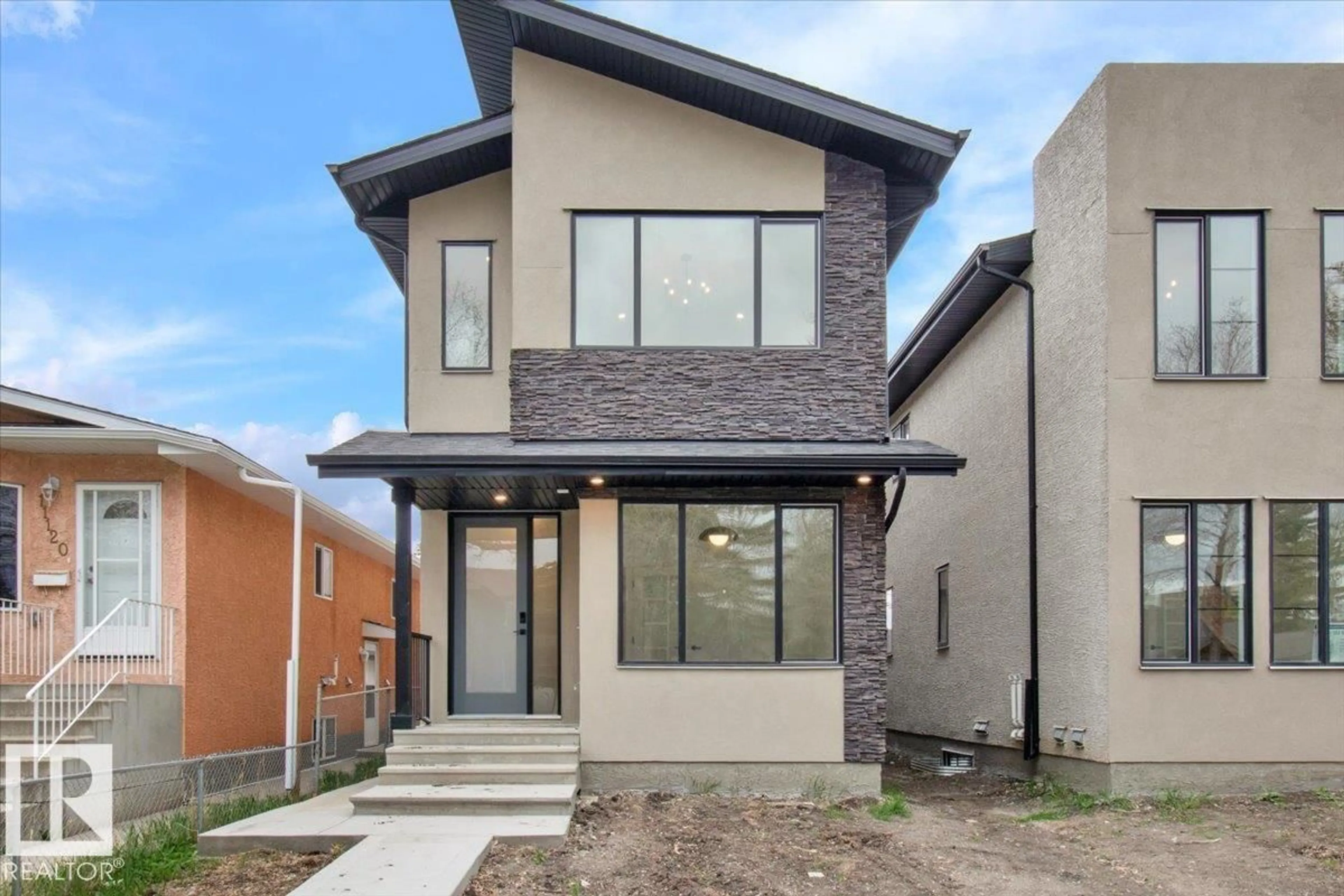 Home with brick exterior material, street for NW - 11124 132 ST, Edmonton Alberta T5M1E5