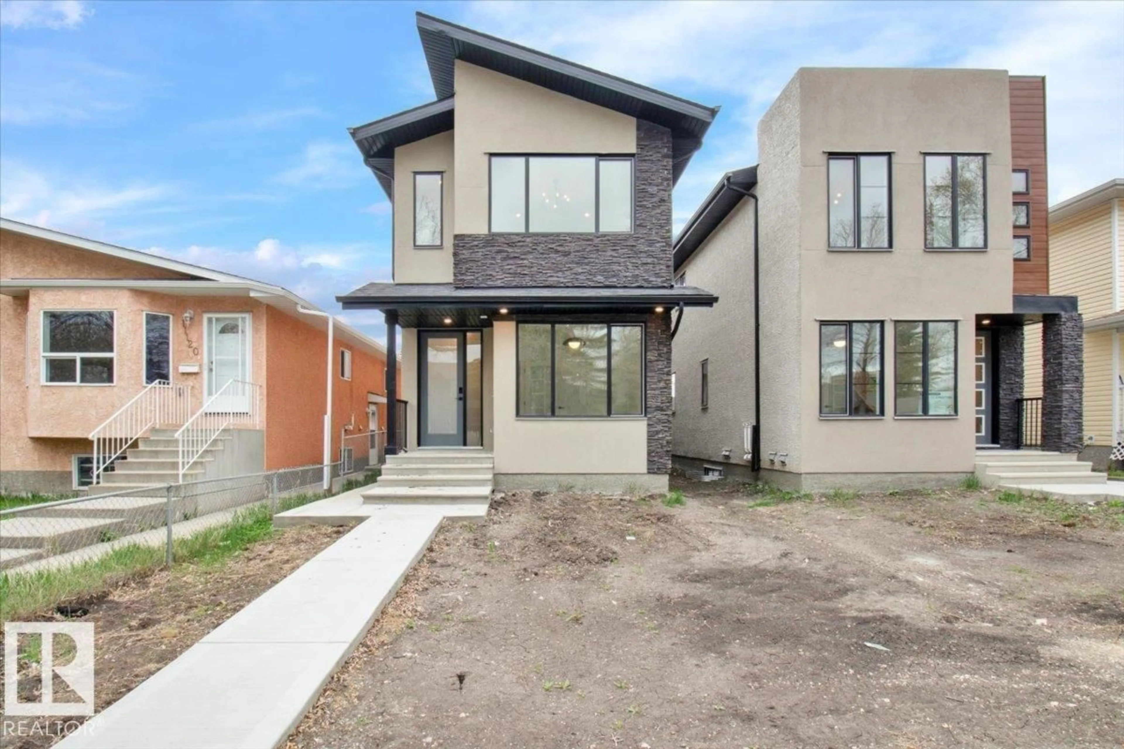 Home with brick exterior material, street for NW - 11124 132 ST, Edmonton Alberta T5M1E5
