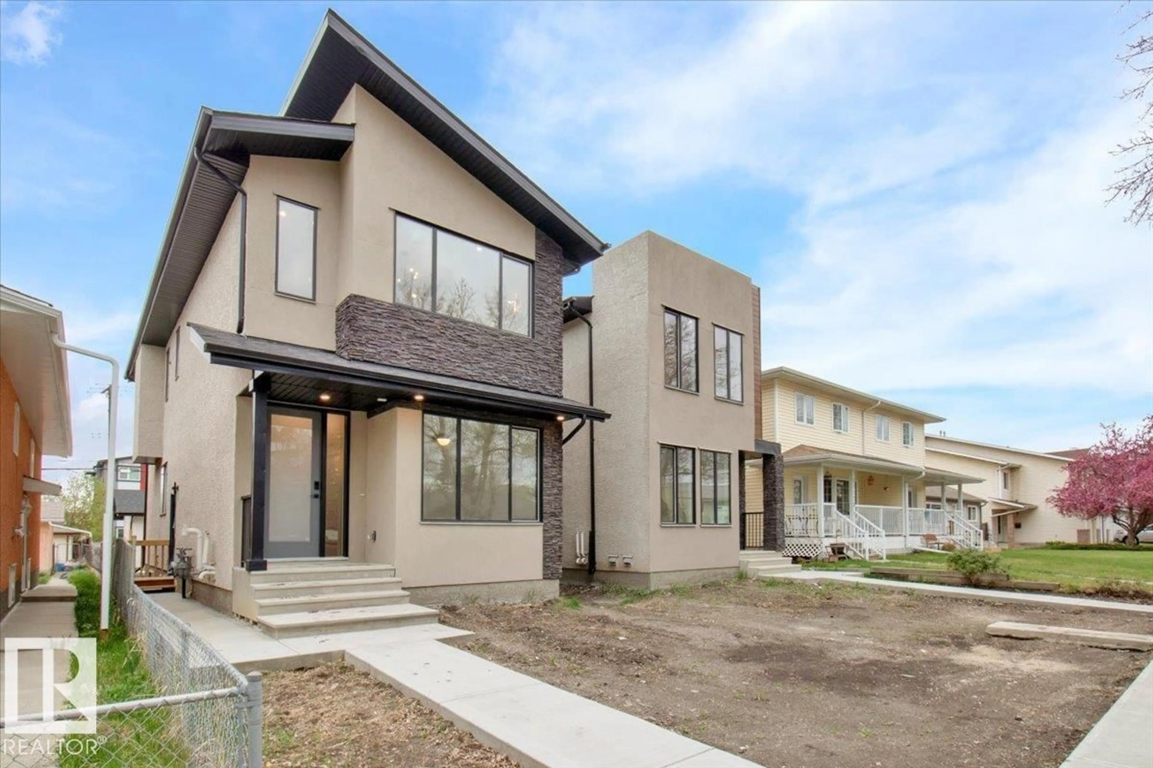 Home with brick exterior material, street for NW - 11124 132 ST, Edmonton Alberta T5M1E5