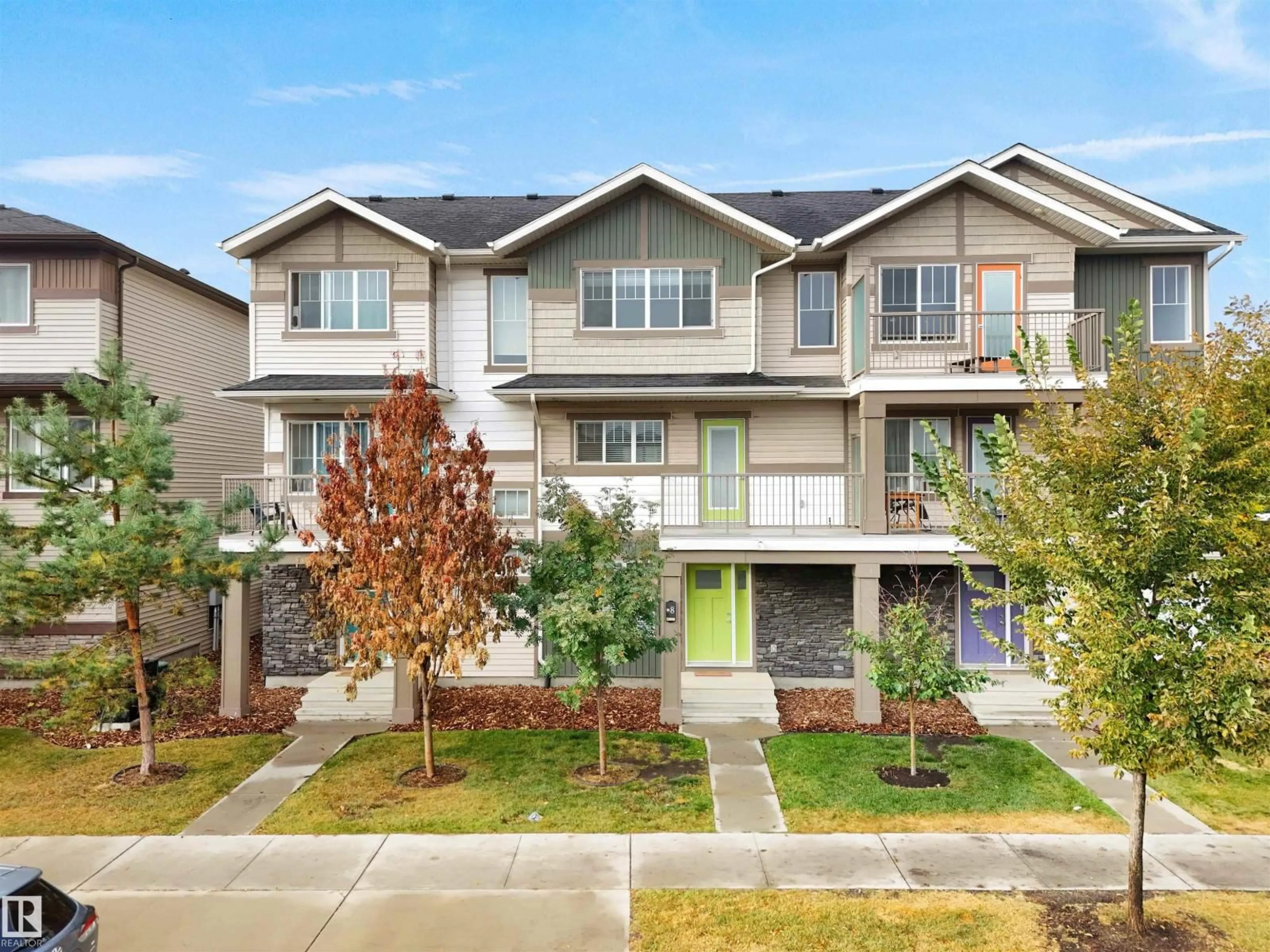 Home with vinyl exterior material, street for #8 - 1530 TAMARACK BV, Edmonton Alberta T6T0V7