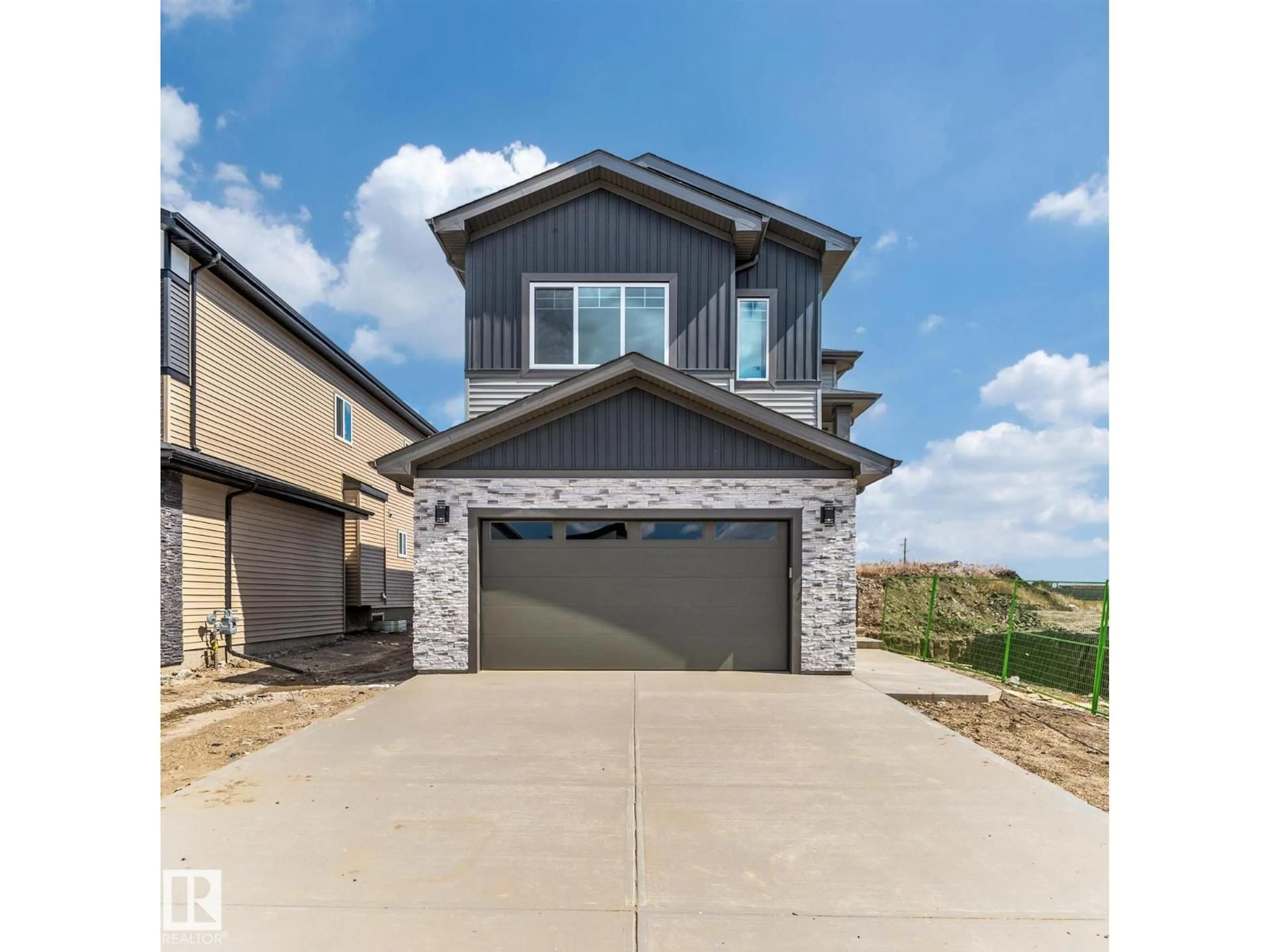 Home with brick exterior material, street for NE - 6245 19 ST, Rural Leduc County Alberta T4X3C8