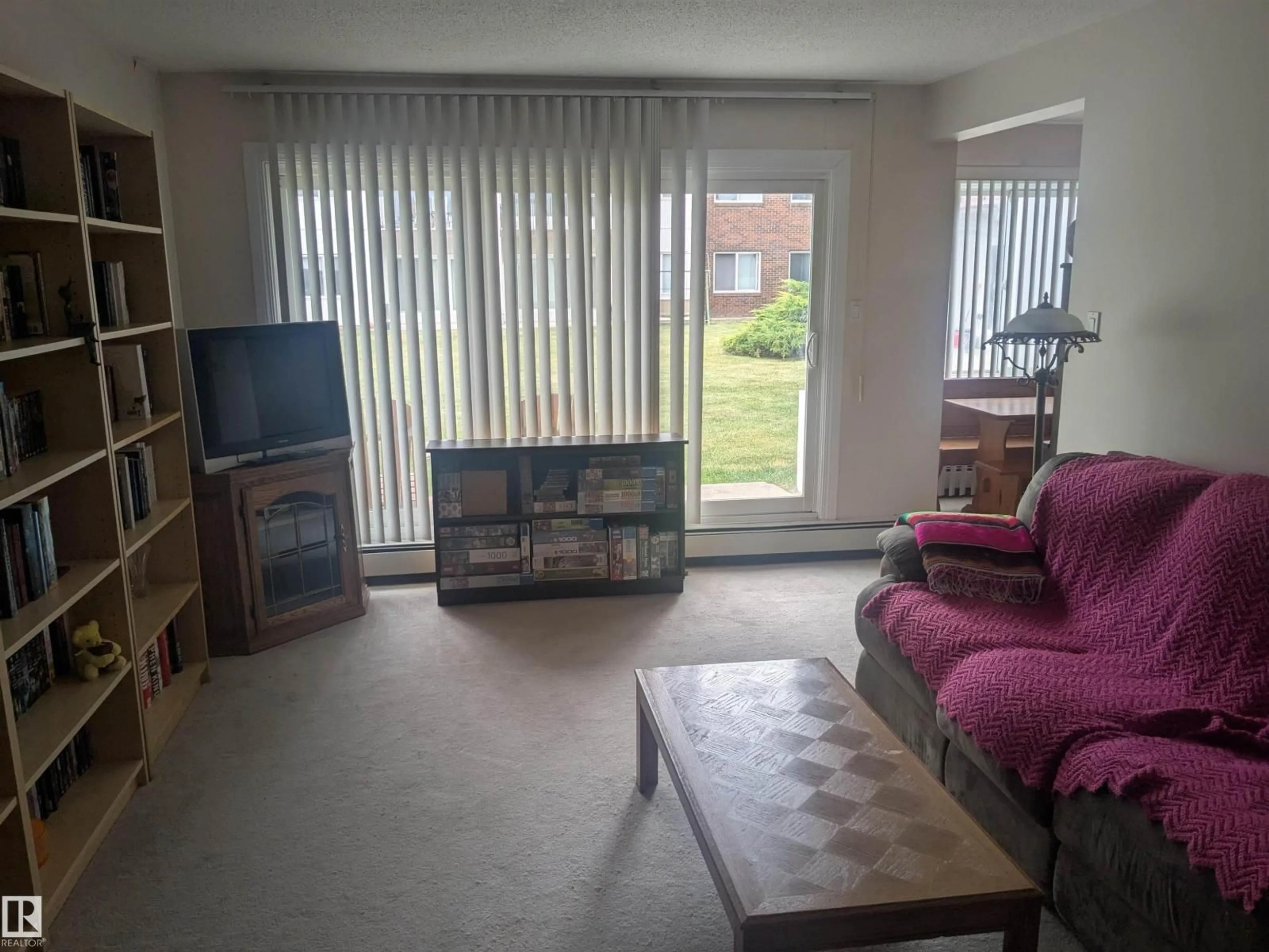 Living room with furniture, floor is not visible for 105 - 11415 41 AV, Edmonton Alberta T6J0T9