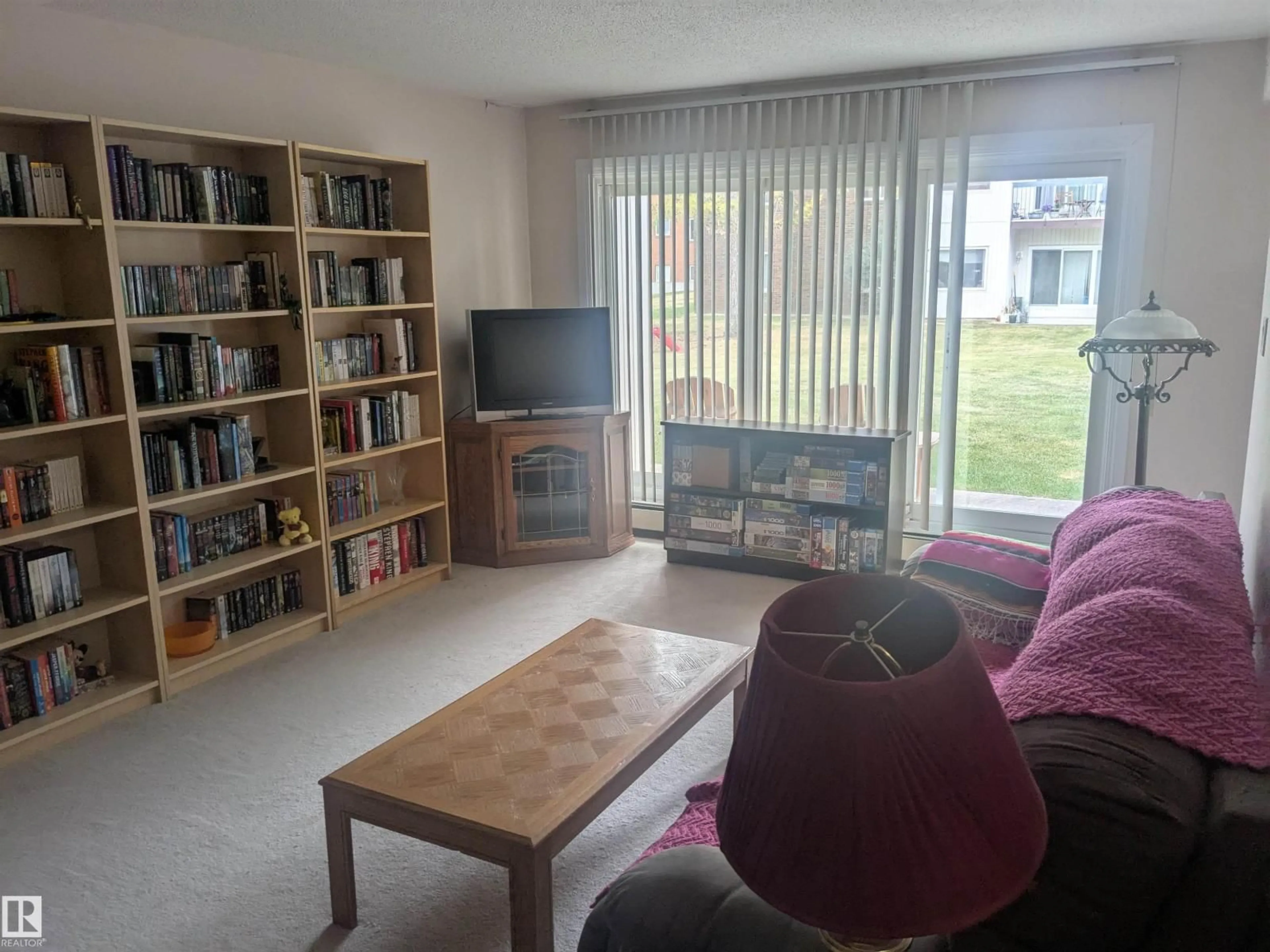 Living room with furniture, unknown for 105 - 11415 41 AV, Edmonton Alberta T6J0T9
