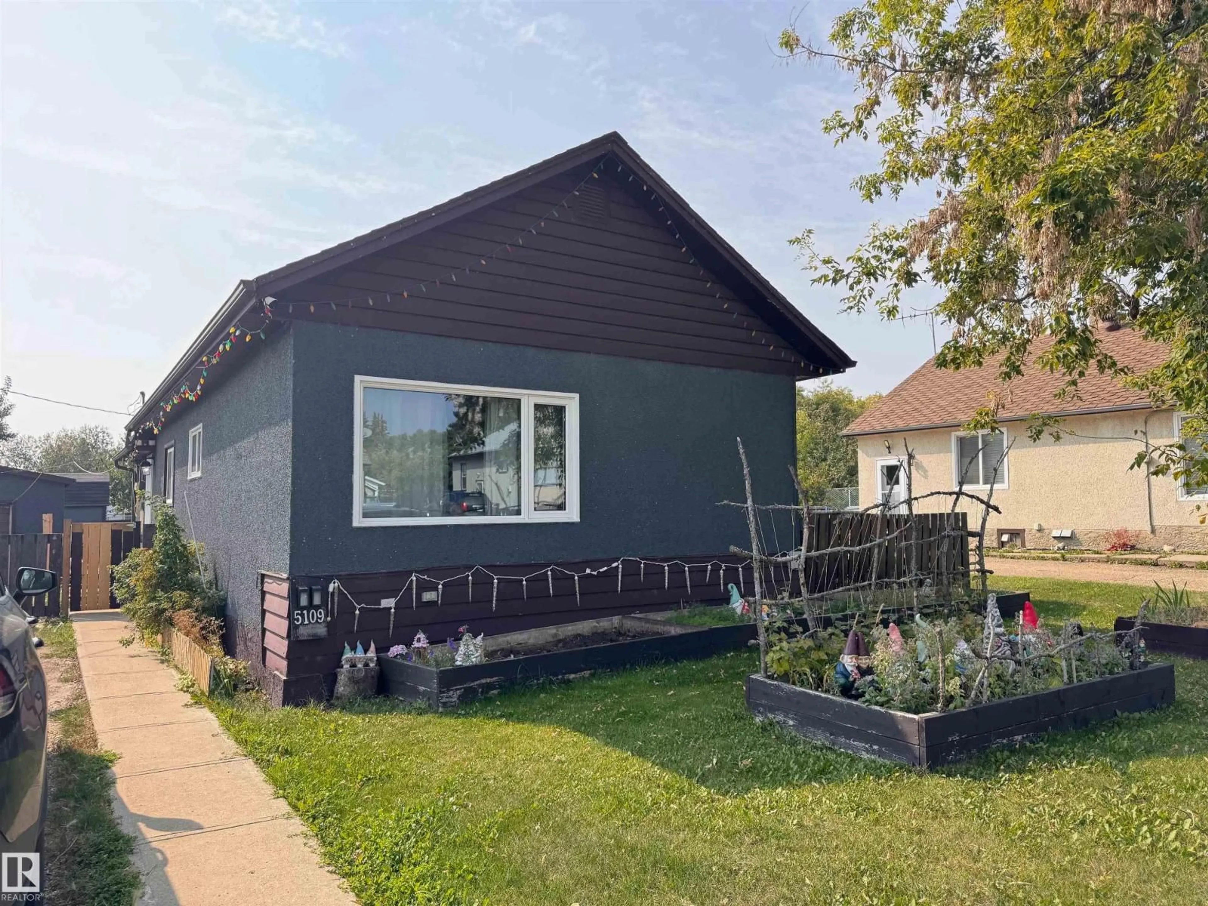 Home with vinyl exterior material, street for 5109 50 AV, Legal Alberta T0G1L0