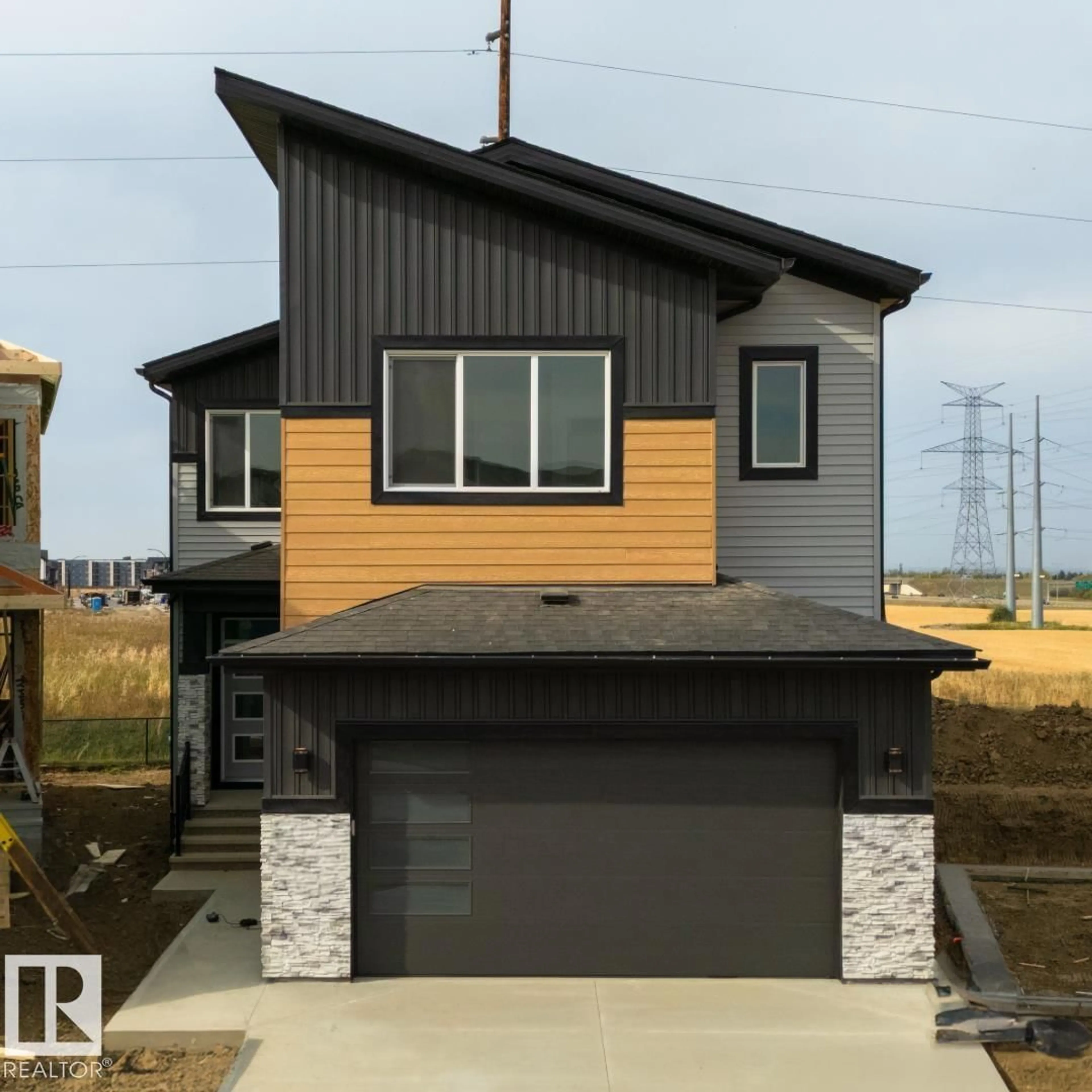 Home with vinyl exterior material, street for SW - 108 25 ST, Edmonton Alberta T6X3K3