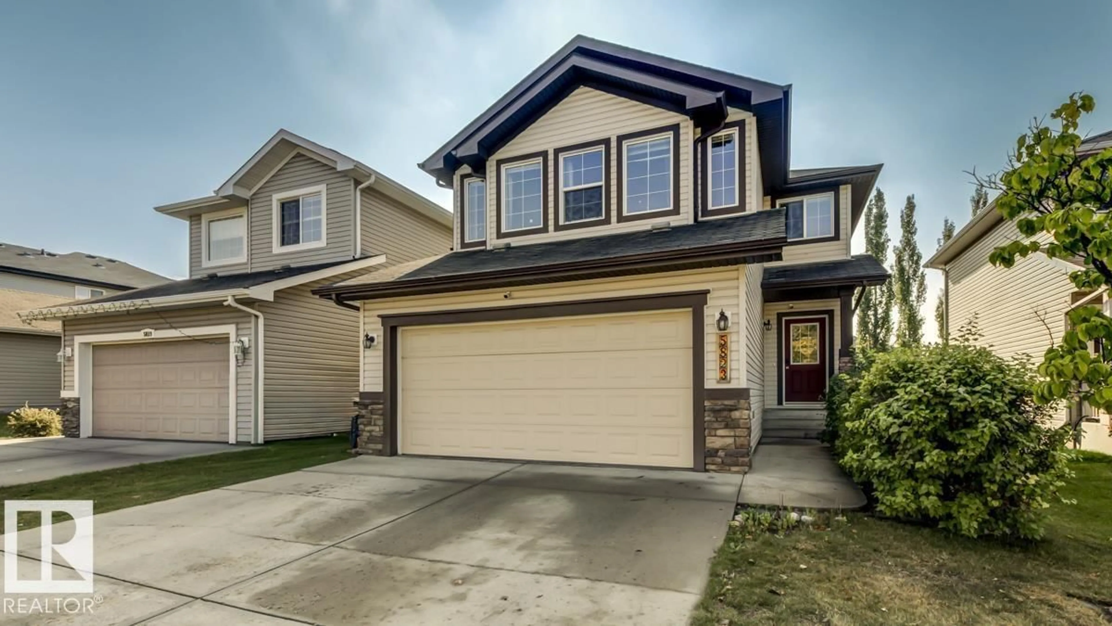 Home with vinyl exterior material, street for 5823 7 AV, Edmonton Alberta T6X0G6