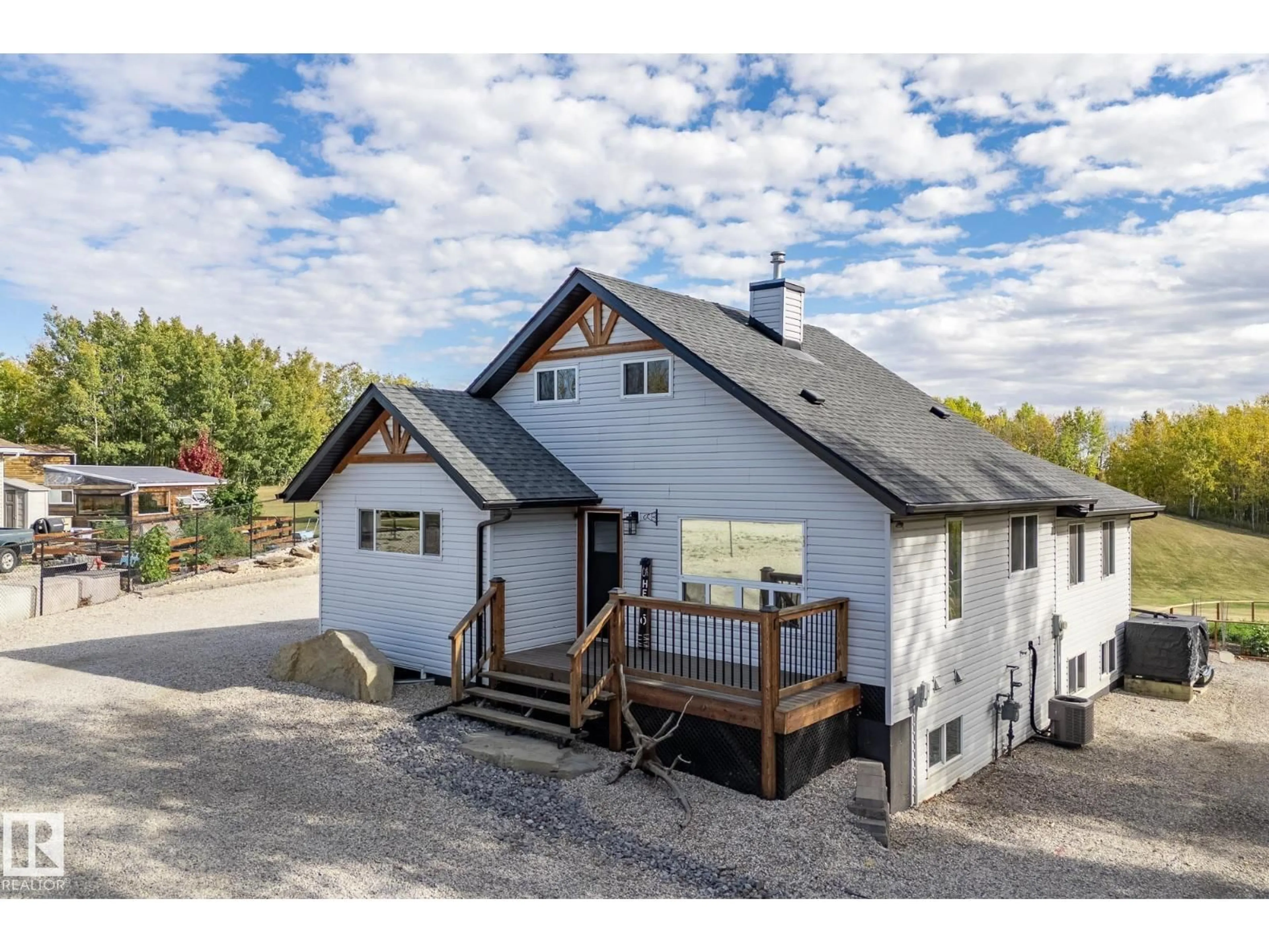 A pic from outside/outdoor area/front of a property/back of a property/a pic from drone, unknown for 105 52318 RGE ROAD 25, Rural Parkland County Alberta T7Y2M3