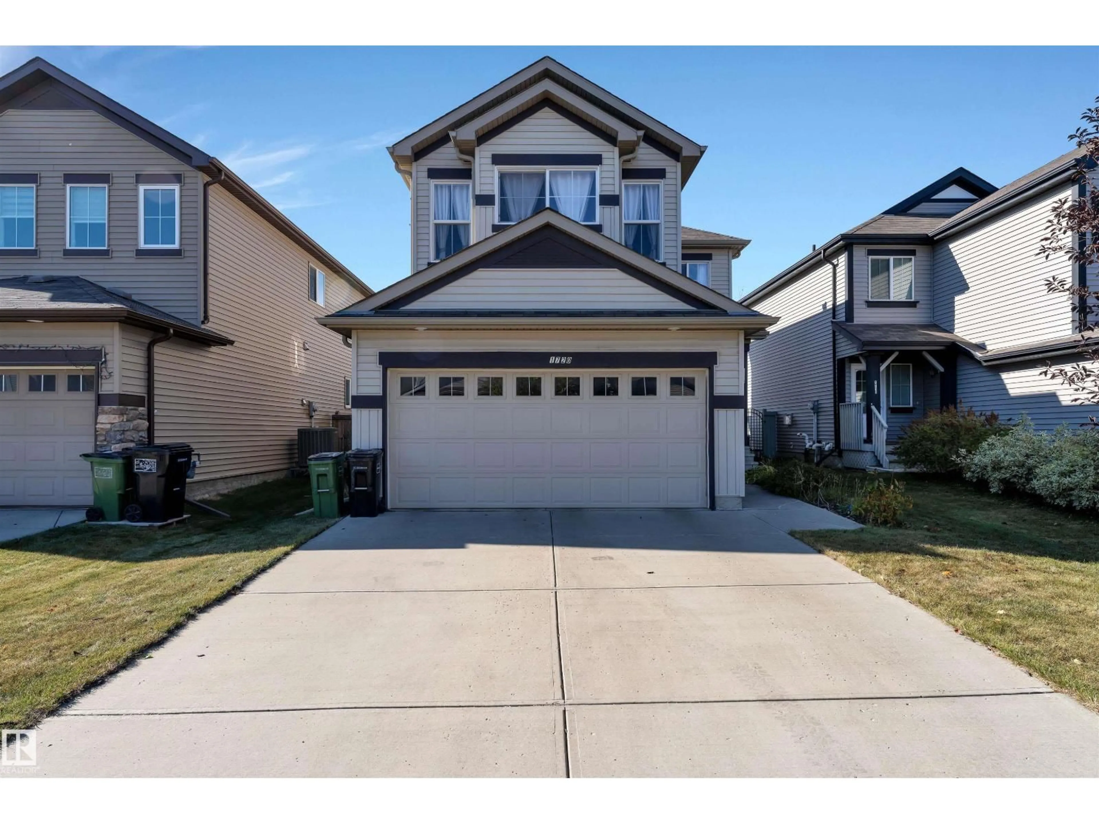 Home with vinyl exterior material, street for SW - 1720 59 ST, Edmonton Alberta T6X0W5