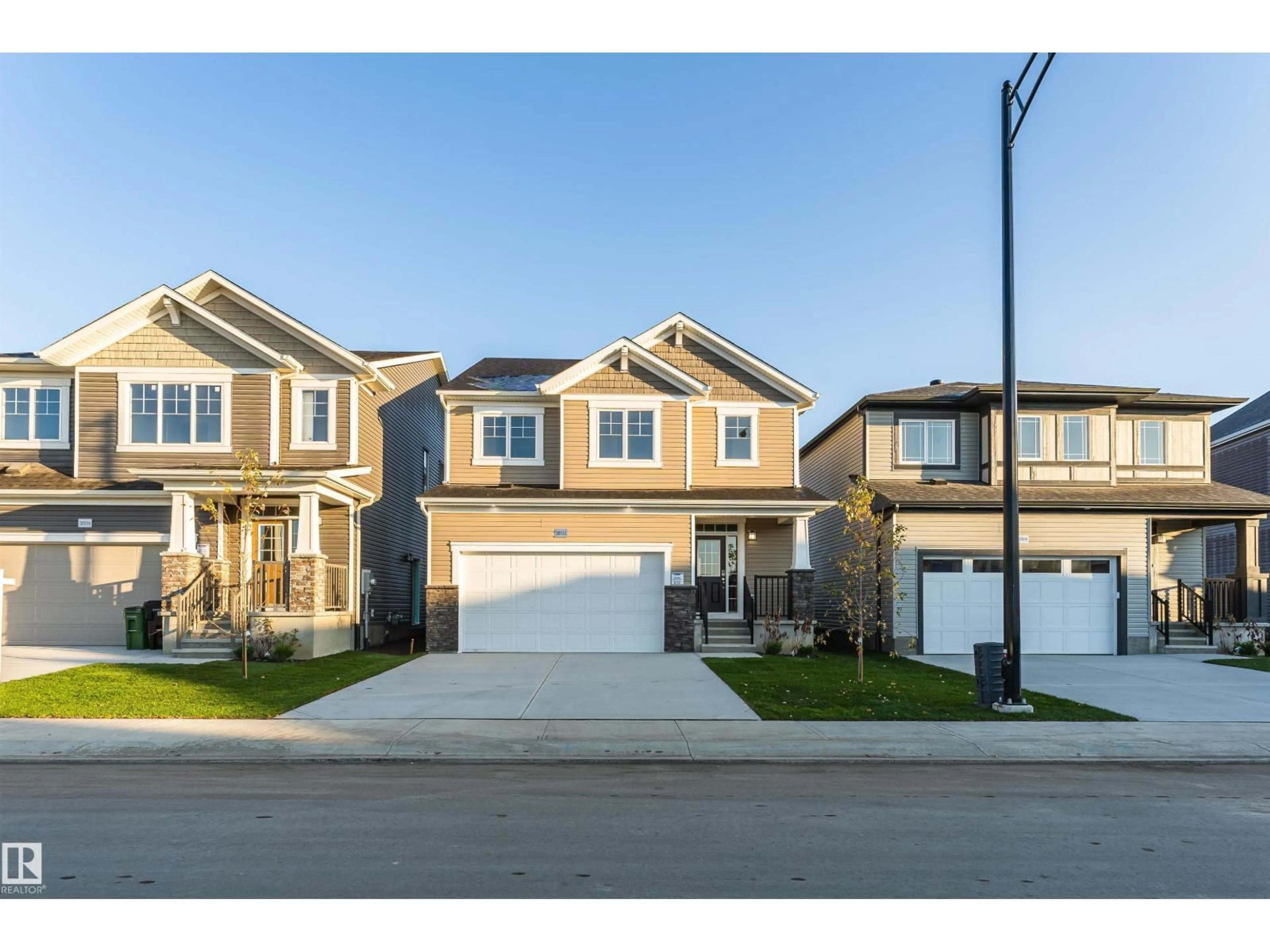 Home with vinyl exterior material, street for 20512 22 AV, Edmonton Alberta T6M0X9