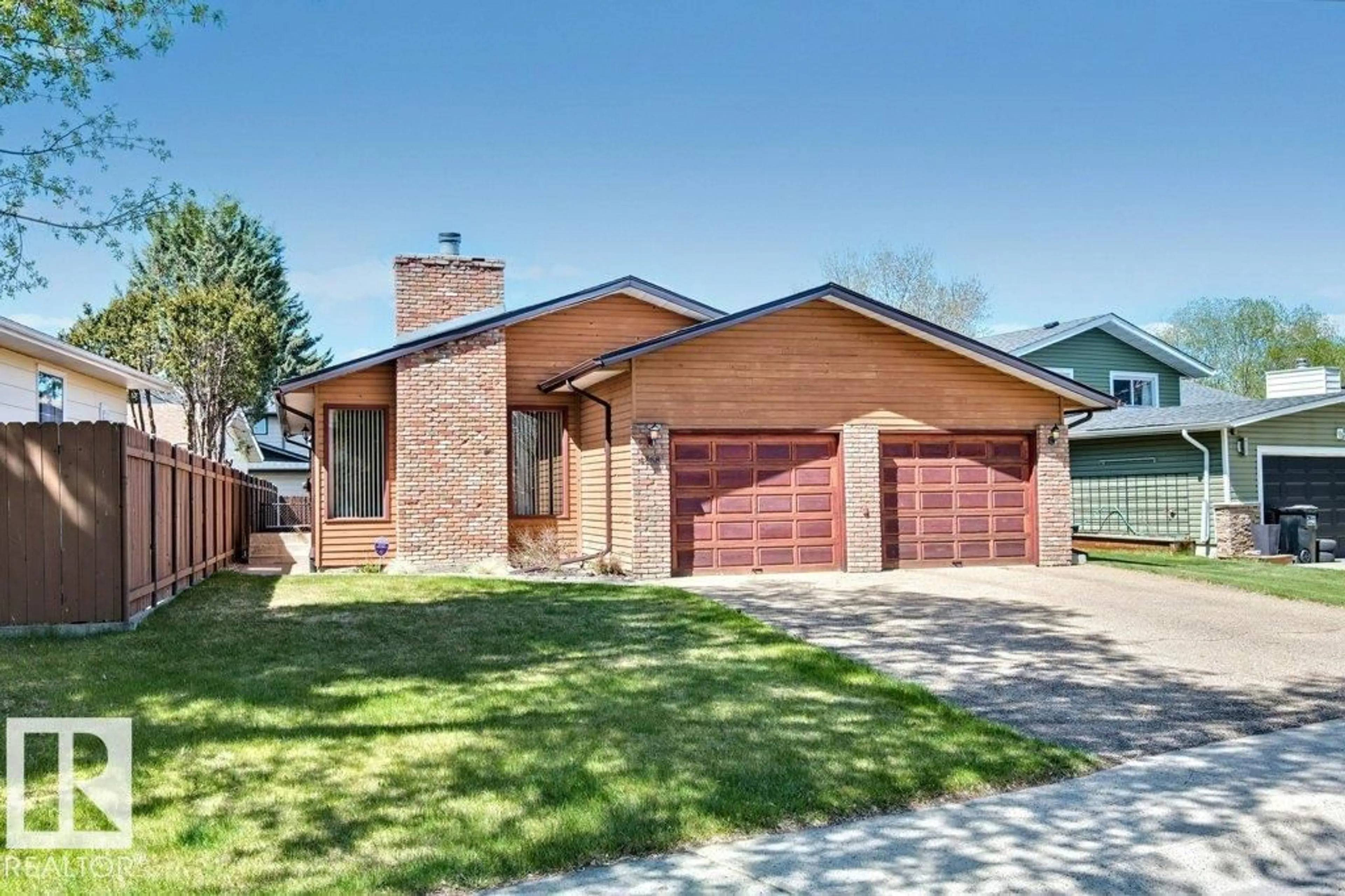 Home with brick exterior material, street for 4668 16A AV, Edmonton Alberta T6L2S2