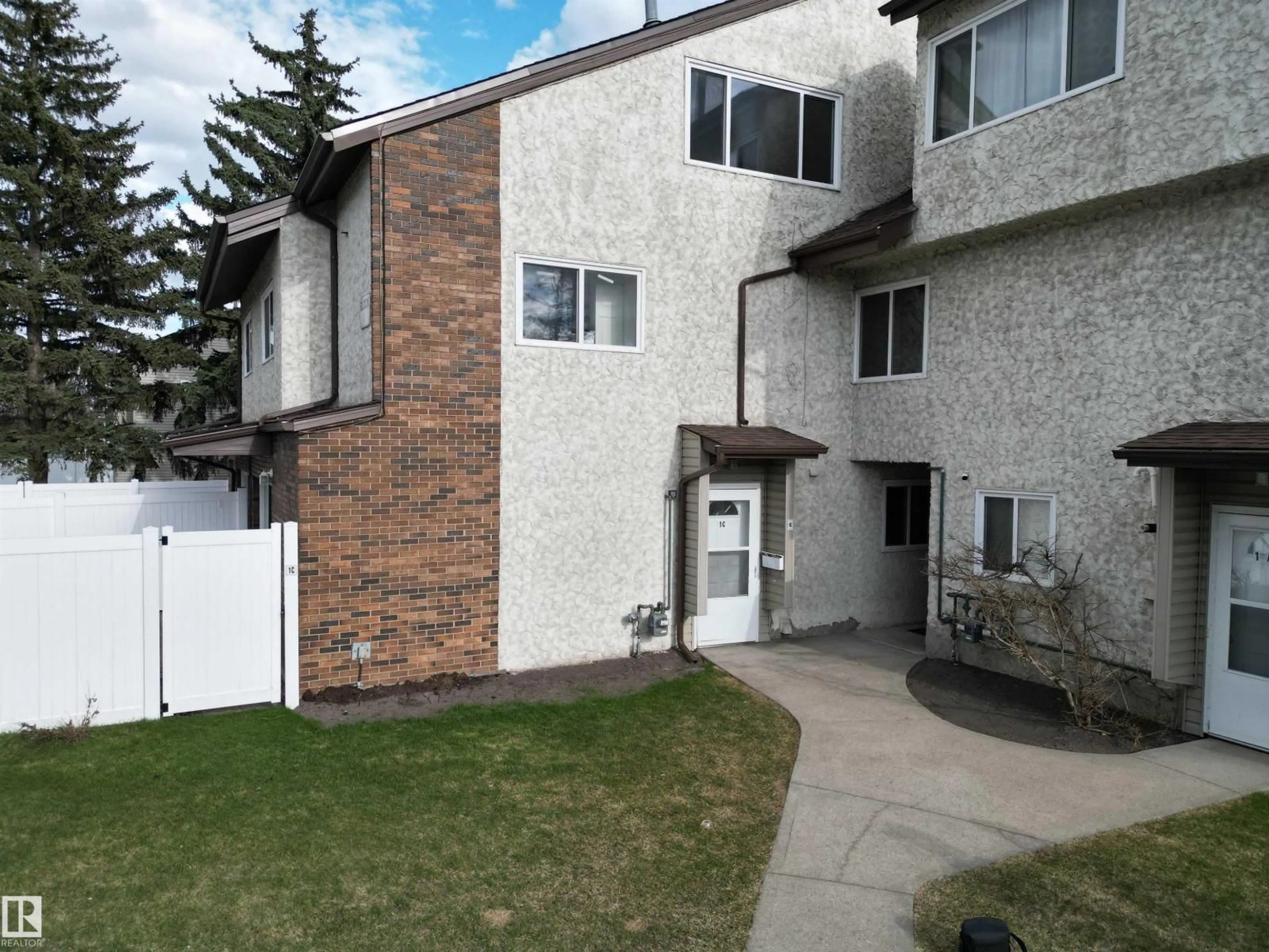 A pic from outside/outdoor area/front of a property/back of a property/a pic from drone, unknown for NW - 1C MEADOWLARK VG, Edmonton Alberta T5R5X3