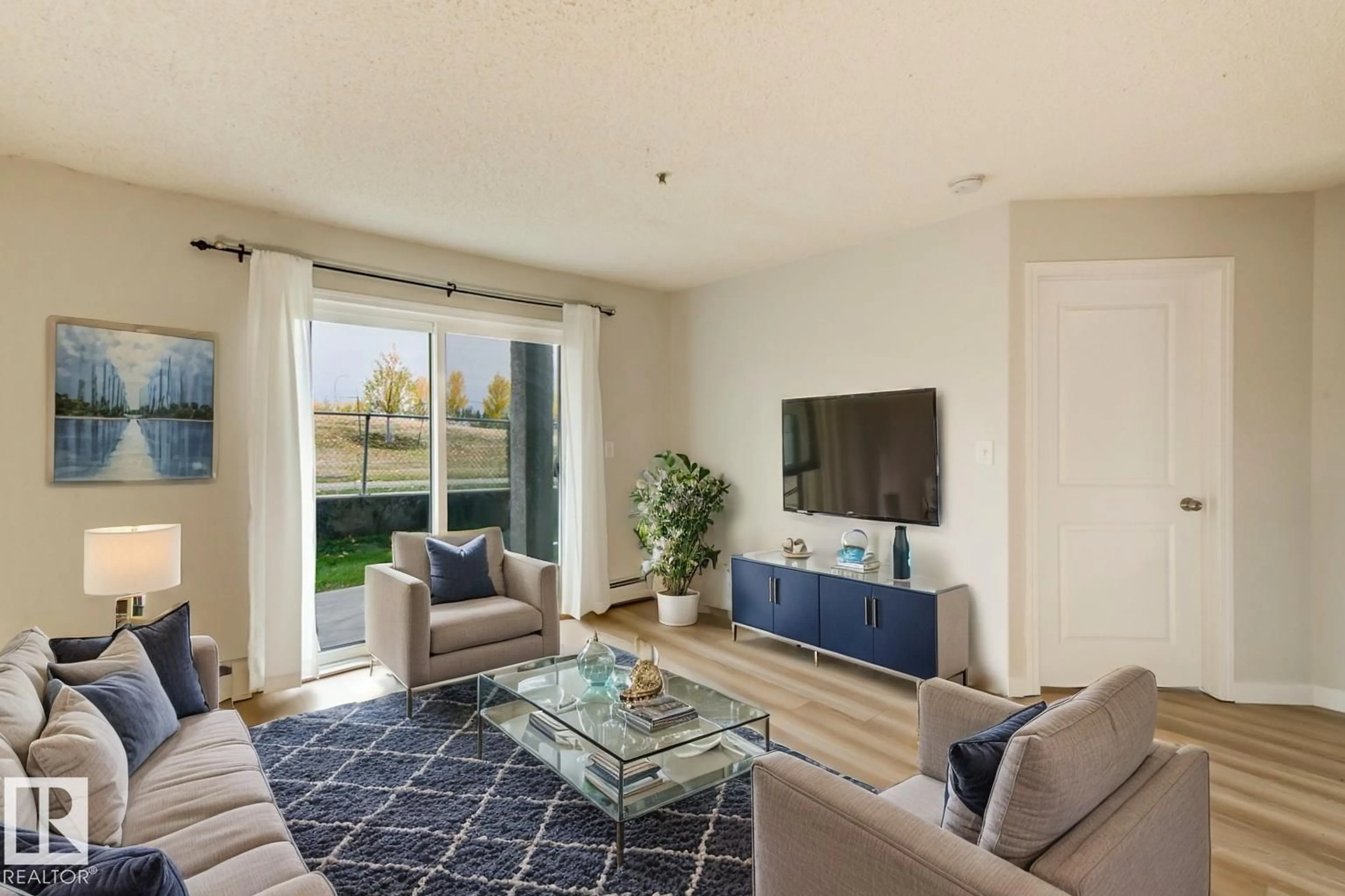 Living room with furniture, unknown for 14708 - 116 50 ST, Edmonton Alberta T5A5G9