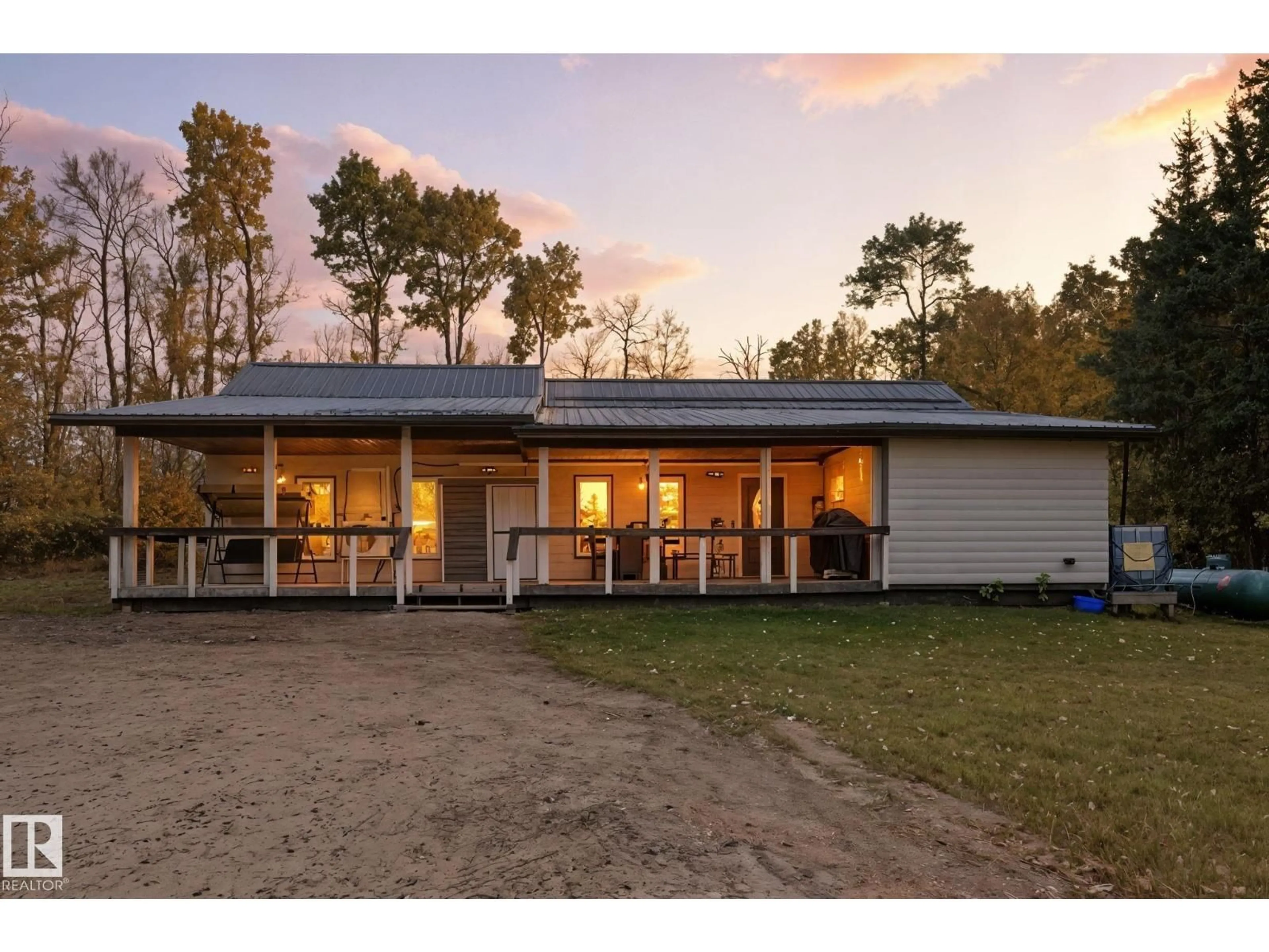 A pic from outside/outdoor area/front of a property/back of a property/a pic from drone, building for #32 - 56110 RGE ROAD 13, Rural Lac Ste. Anne County Alberta T0E1V0