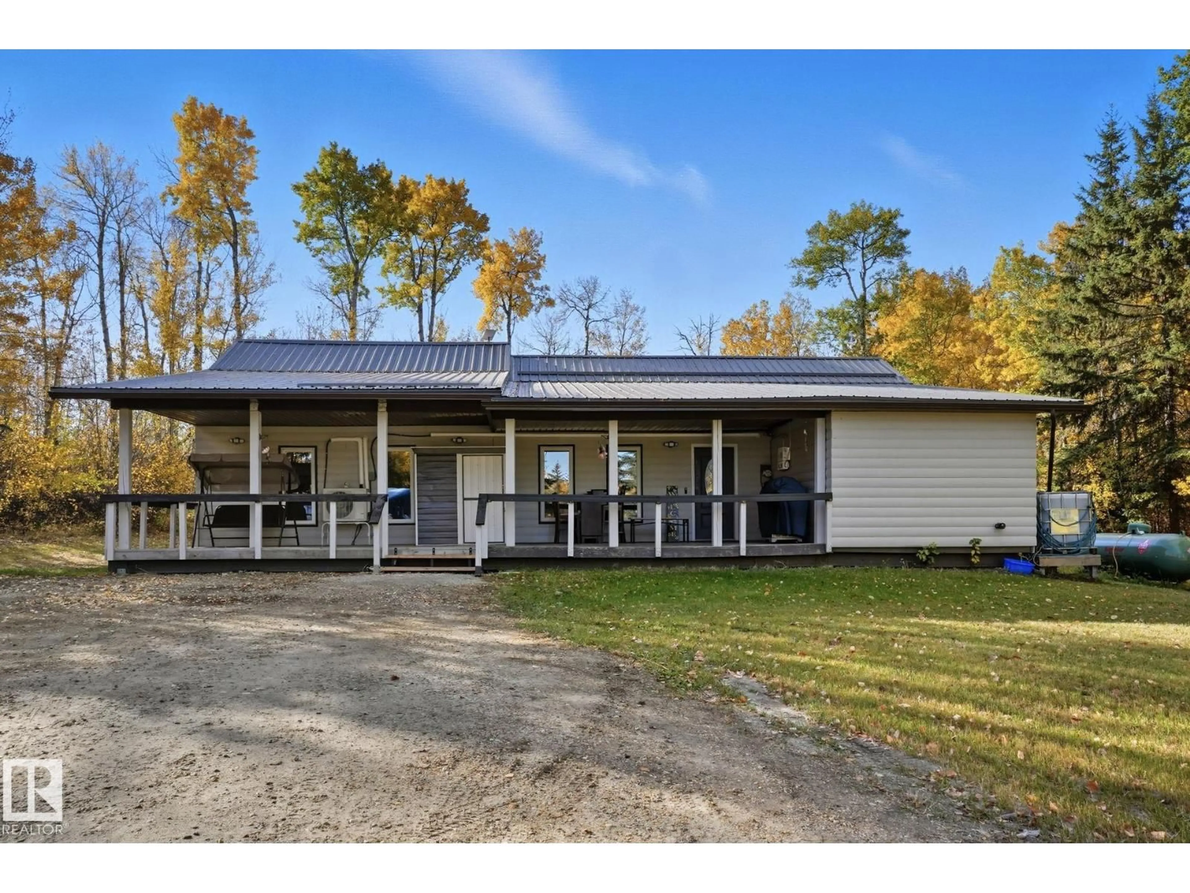 A pic from outside/outdoor area/front of a property/back of a property/a pic from drone, building for #32 - 56110 RGE ROAD 13, Rural Lac Ste. Anne County Alberta T0E1V0