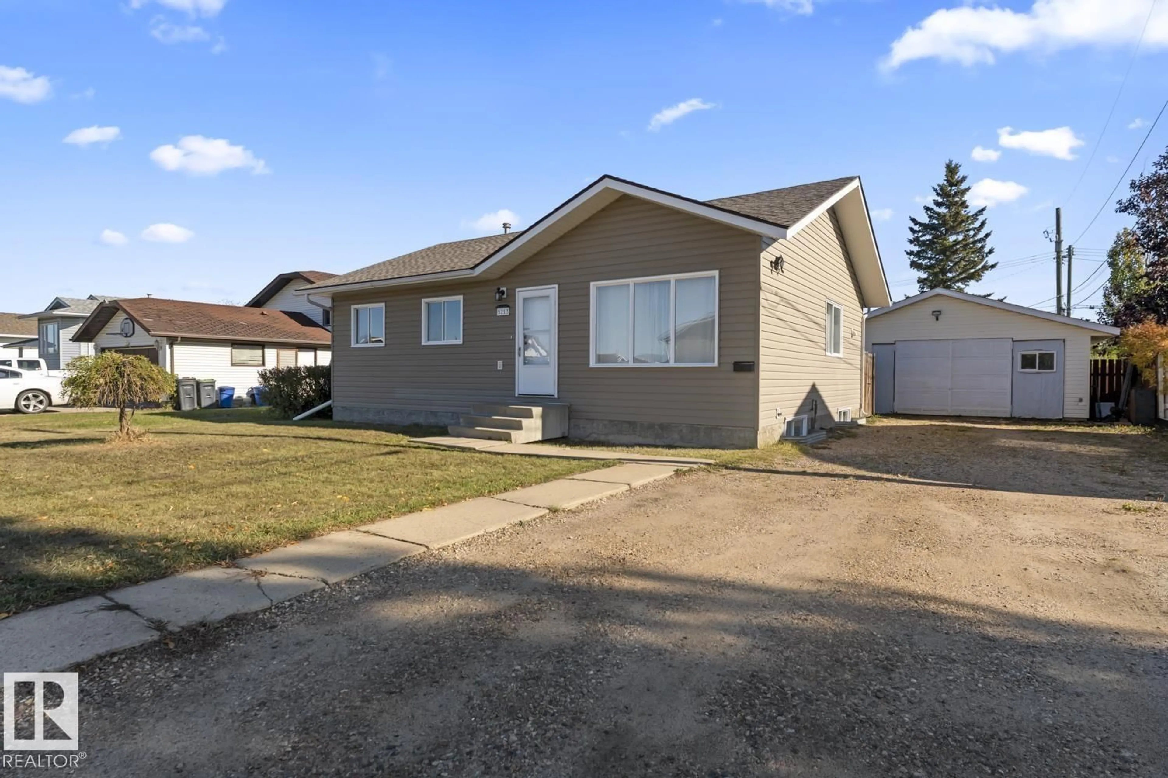 Home with vinyl exterior material, street for 5213 60 ST, Cold Lake Alberta T9M1T4