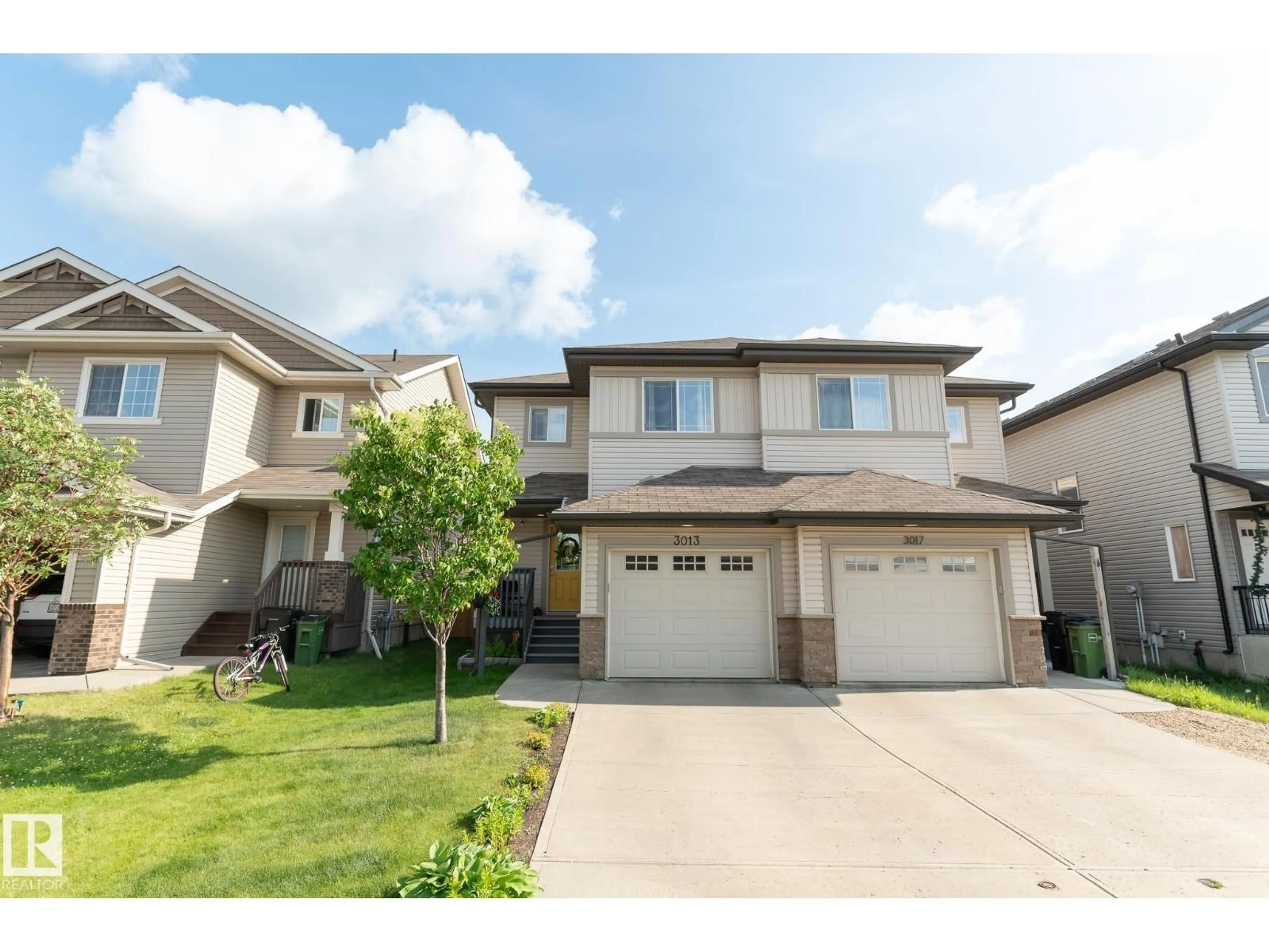 Home with vinyl exterior material, street for 3013 16A AV, Edmonton Alberta T6T0P8