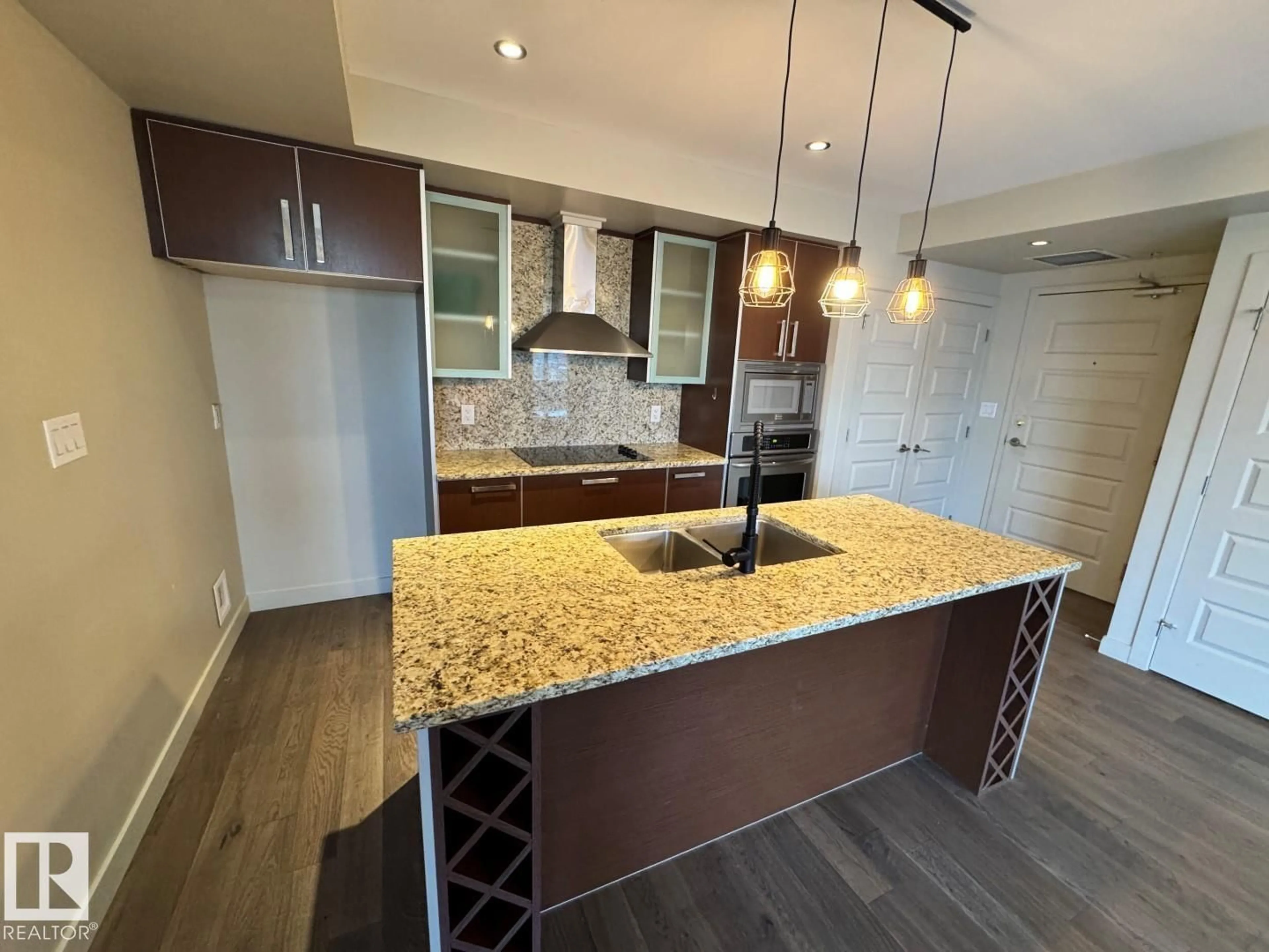 Open concept kitchen, unknown for #307 - 10388 105 ST, Edmonton Alberta T5J0C2