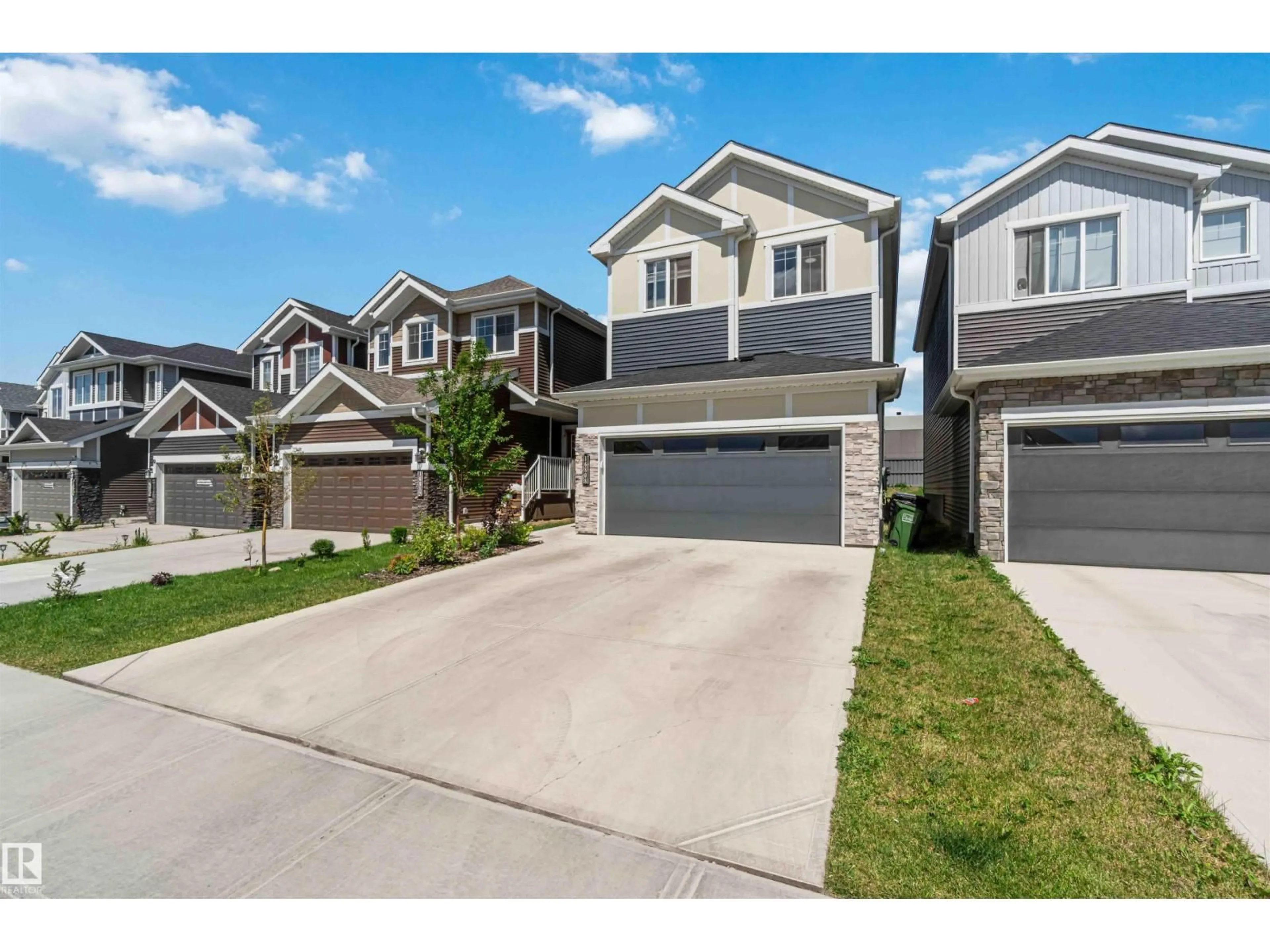 Home with vinyl exterior material, street for SW - 16808 30 AV, Edmonton Alberta T6W5A3